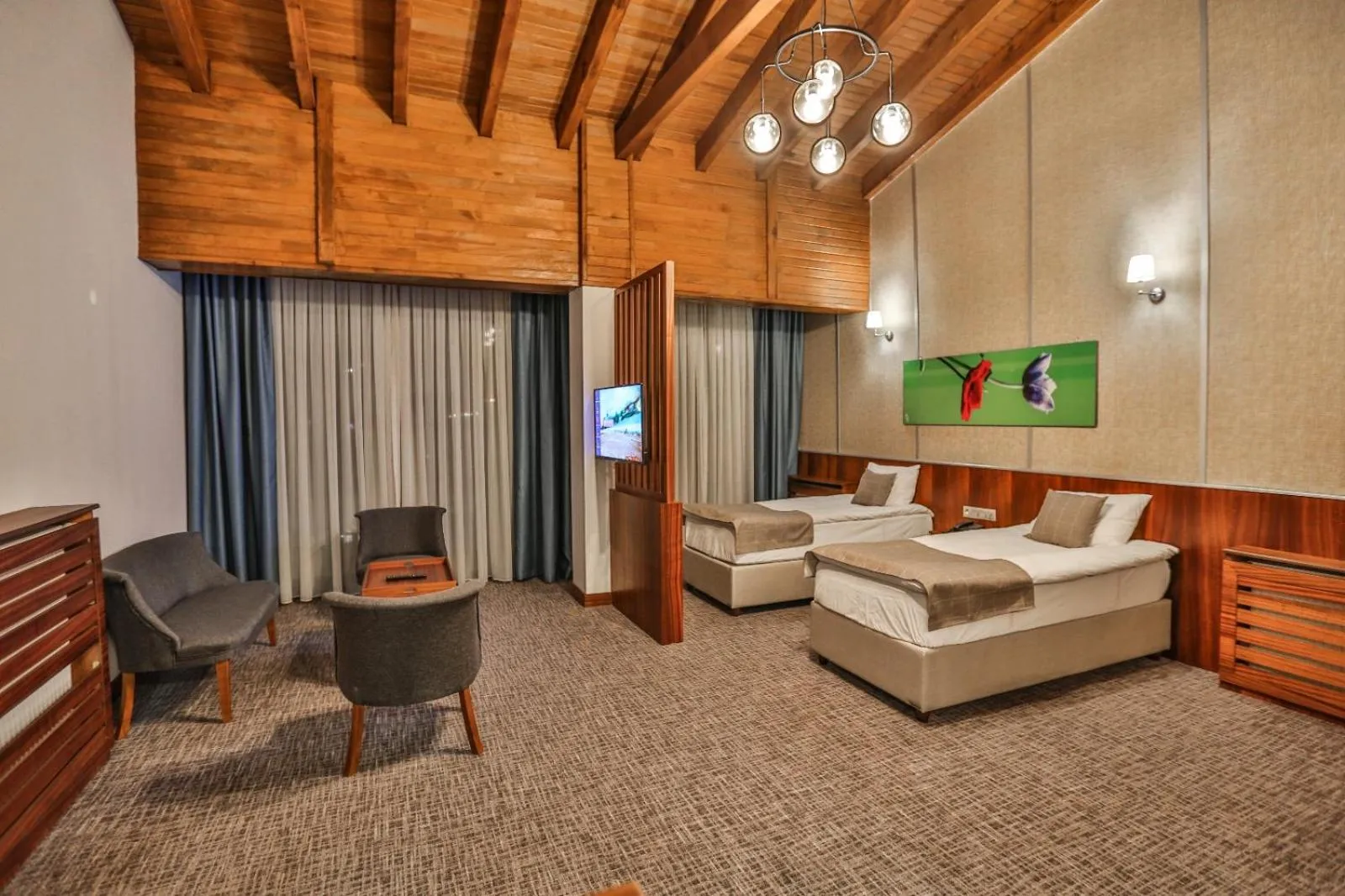 Communal lounge/ TV room, Bed in Akamoy Boztepe Hotel & restaurant