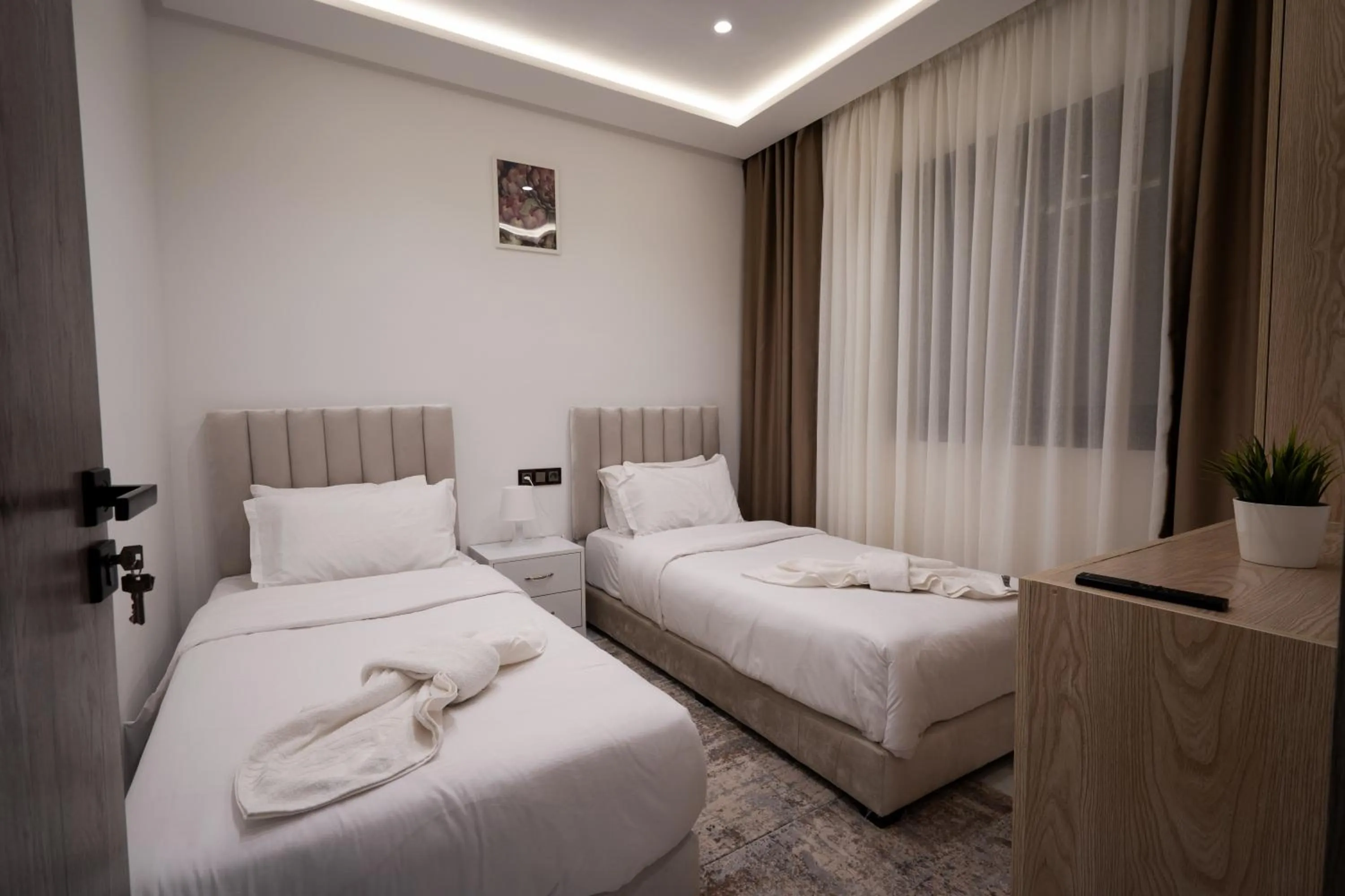 Bed in Living Appart-Hotel