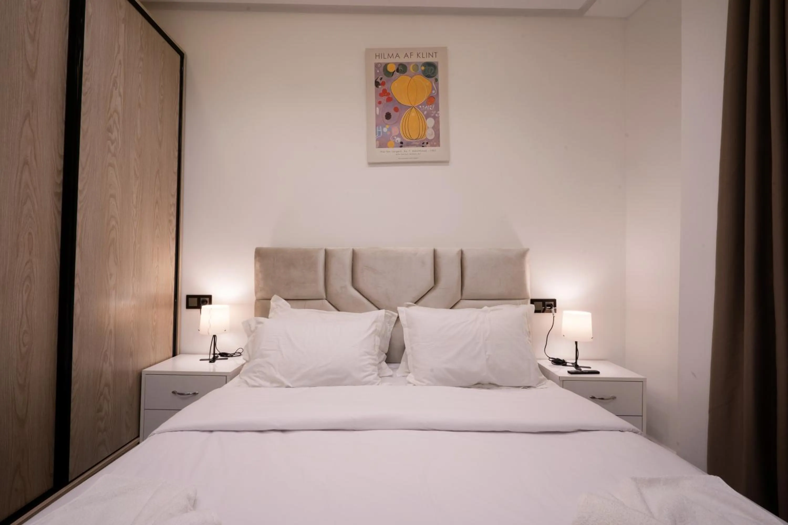 Bed in Living Appart-Hotel