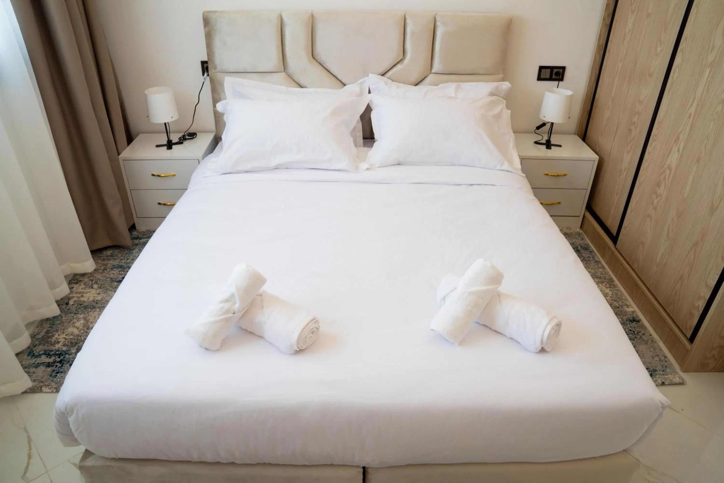 Bed in Living Appart-Hotel