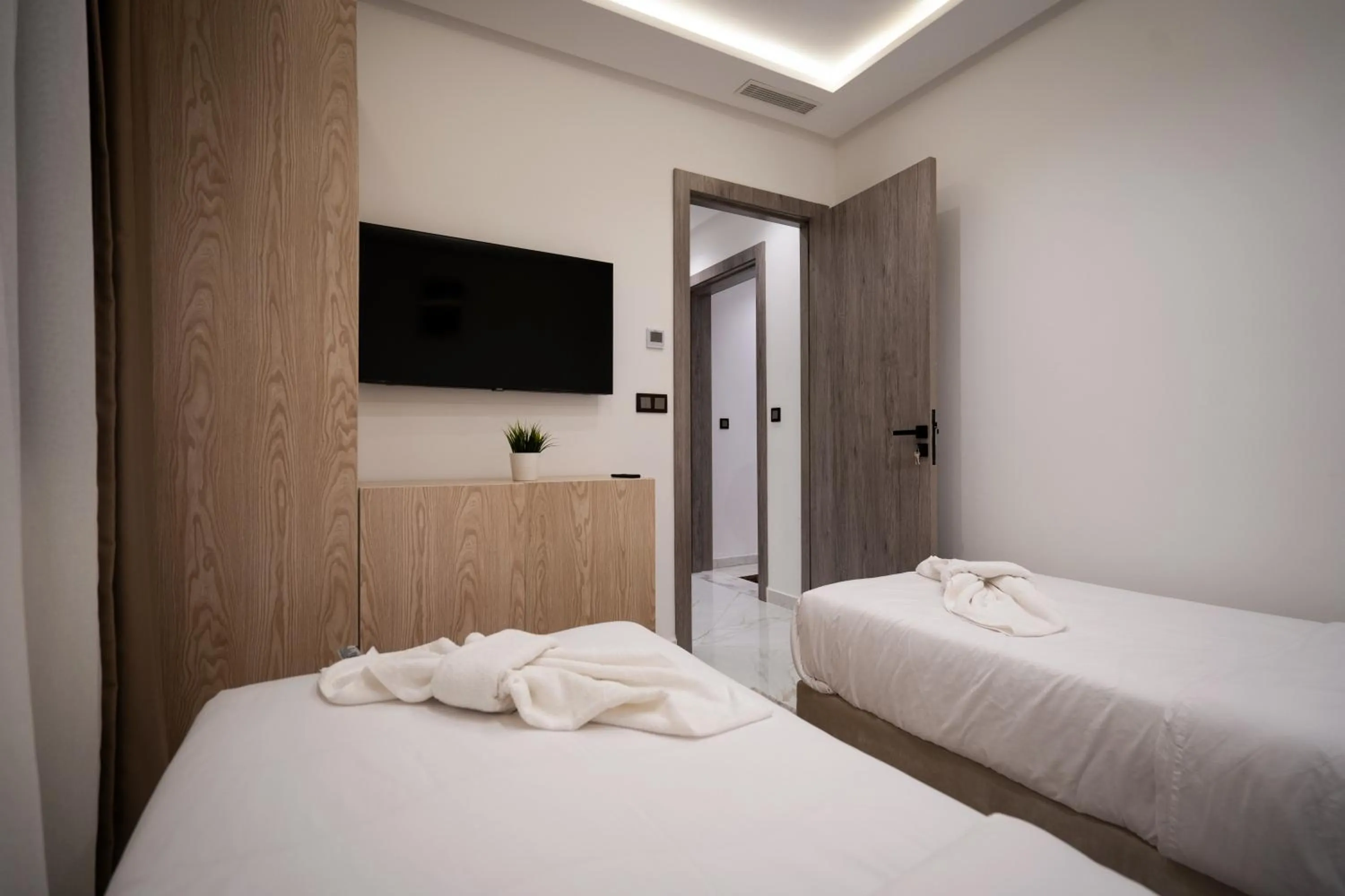 Bed in Living Appart-Hotel
