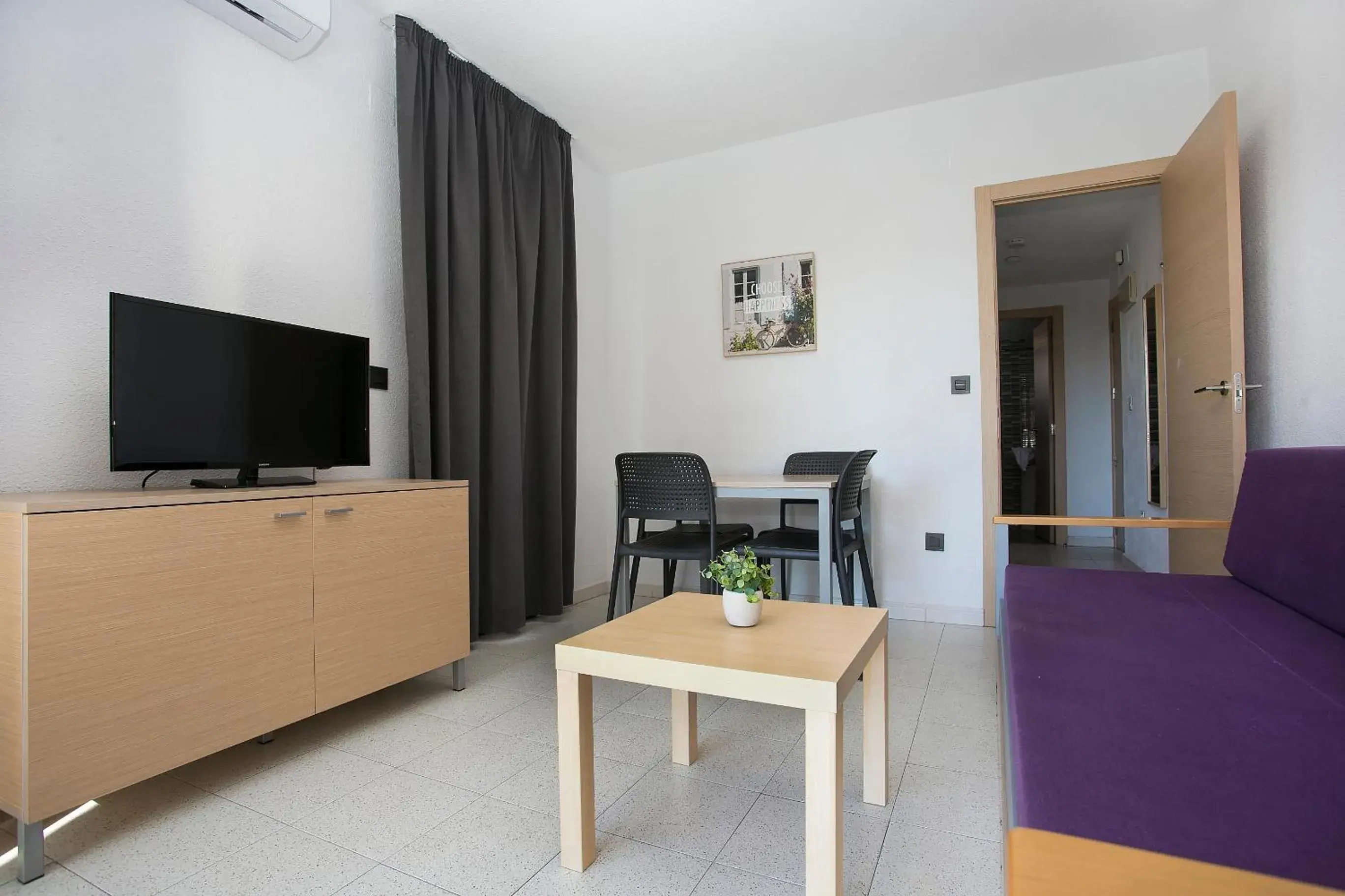 Living room in Apartamentos Amalia By Mc Living room in Apartamentos Amalia By Mc