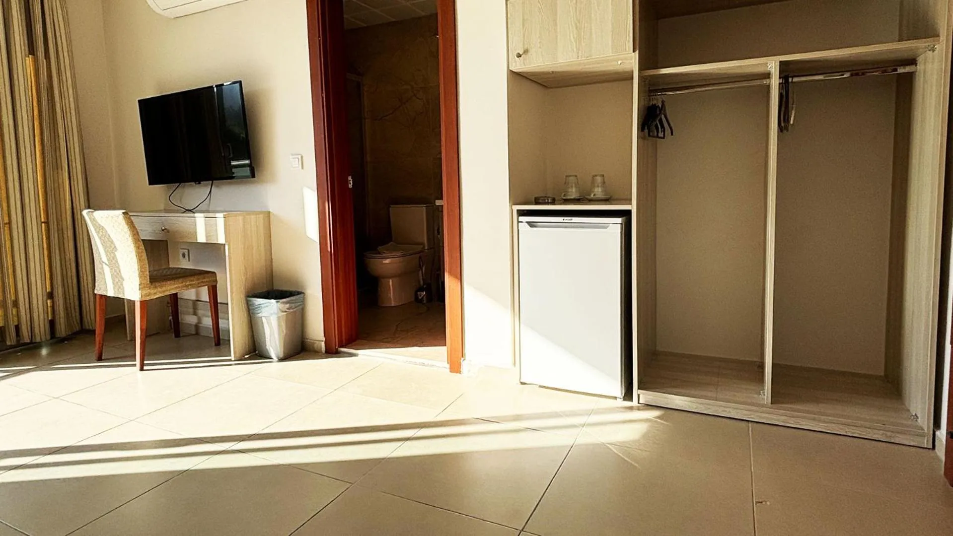 TV and multimedia in Forum Residence Hotel