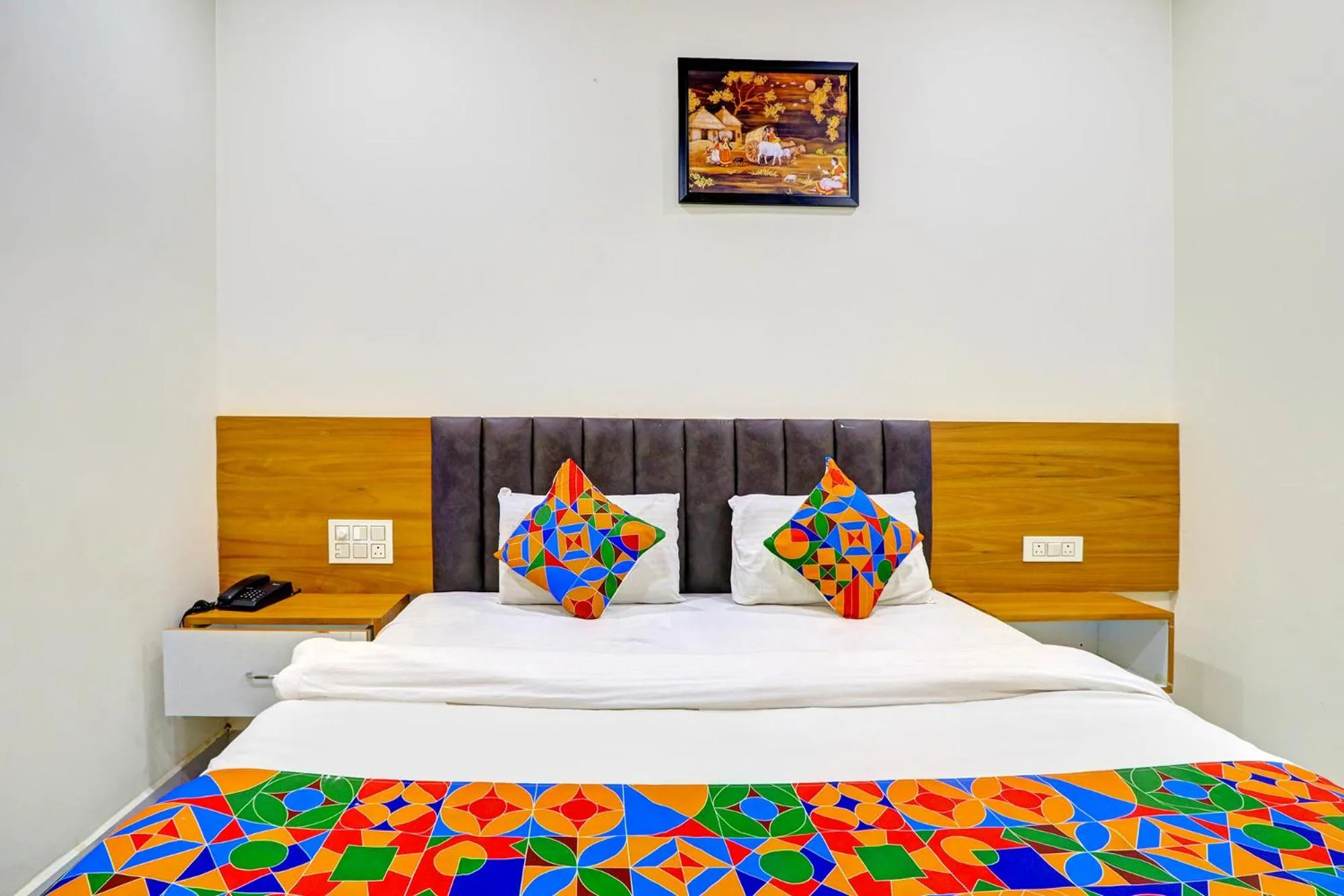 Bed in FabHotel Dharani Grand - Nr Mamata Medical College