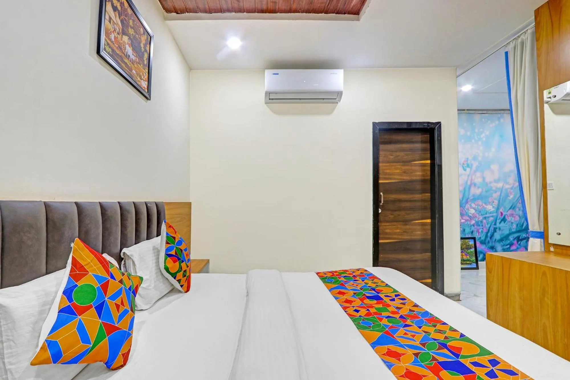 Bed in FabHotel Dharani Grand - Nr Mamata Medical College