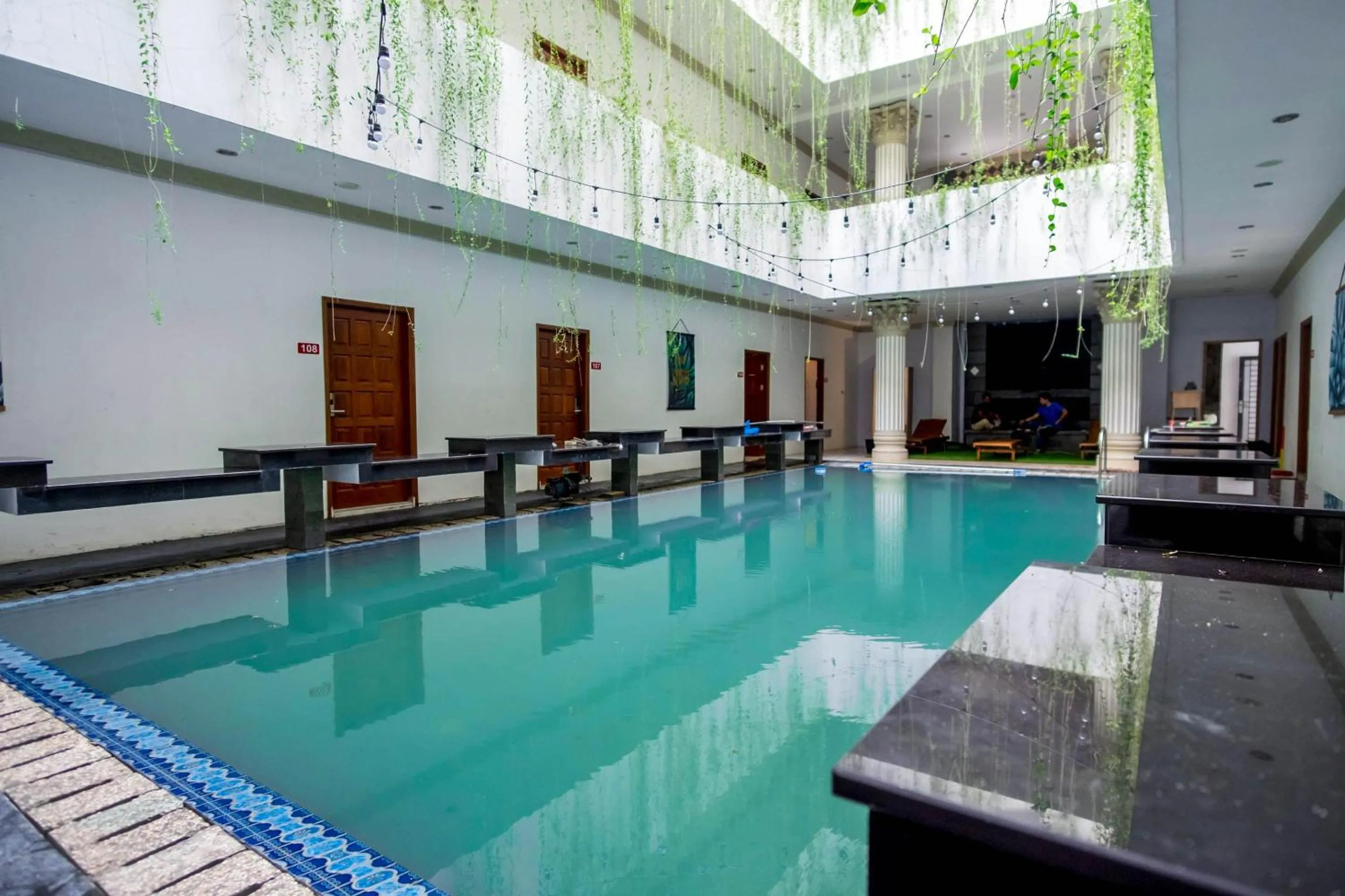 Swimming pool in Capital O 293 Mutiara Hijau Suites Syariah