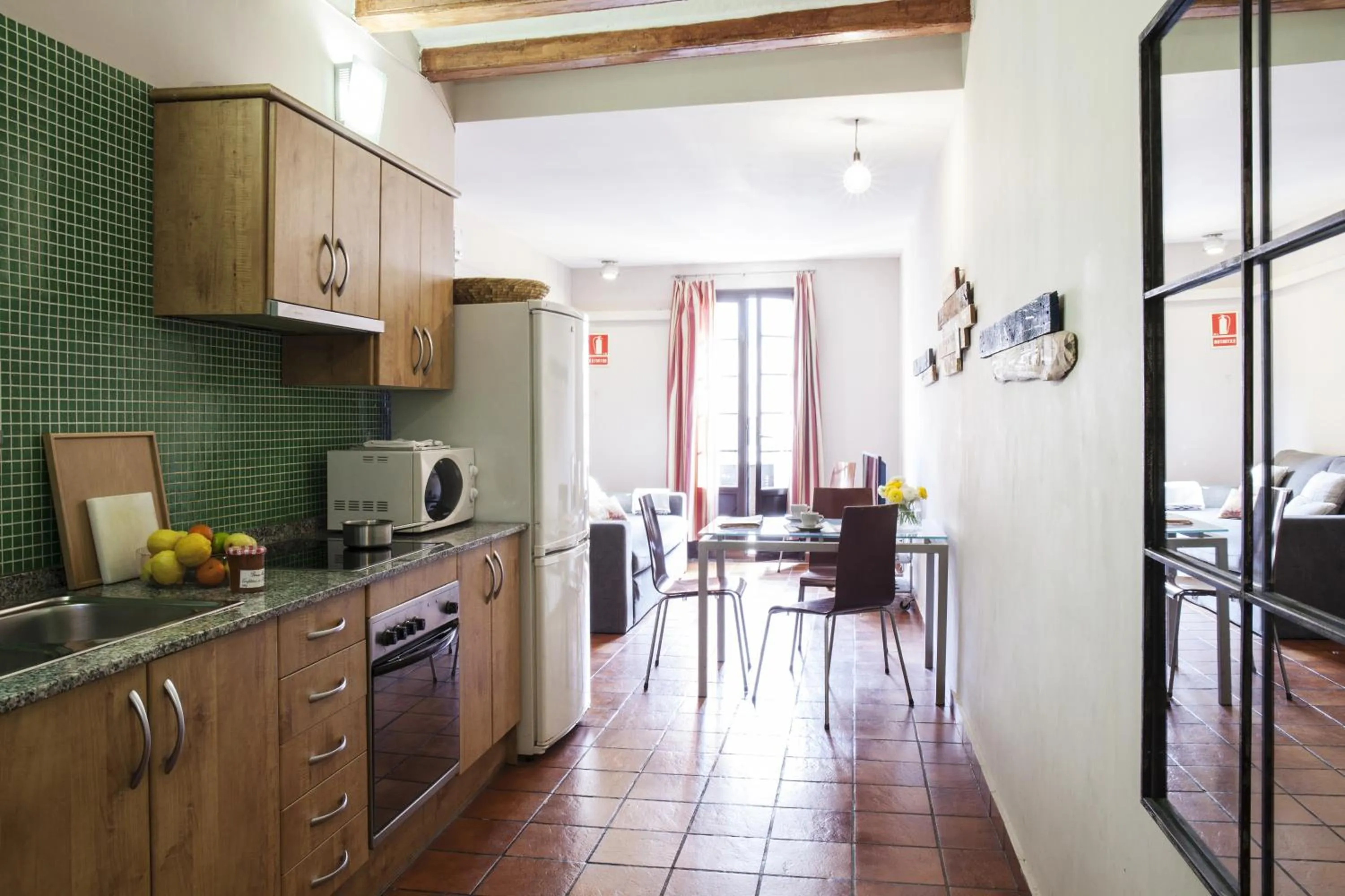 Kitchen or kitchenette in AinB Las Ramblas-Guardia Apartments