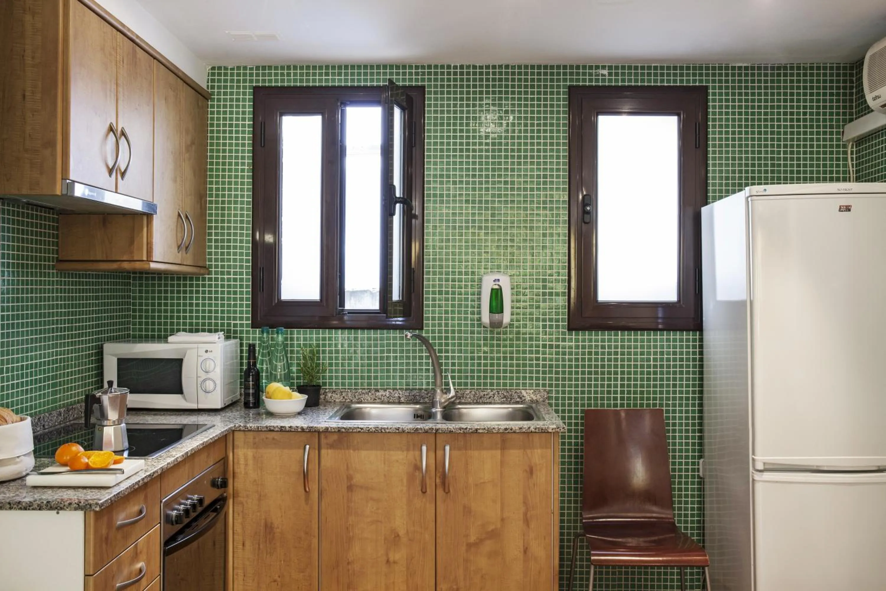 Kitchen or kitchenette in AinB Las Ramblas-Guardia Apartments