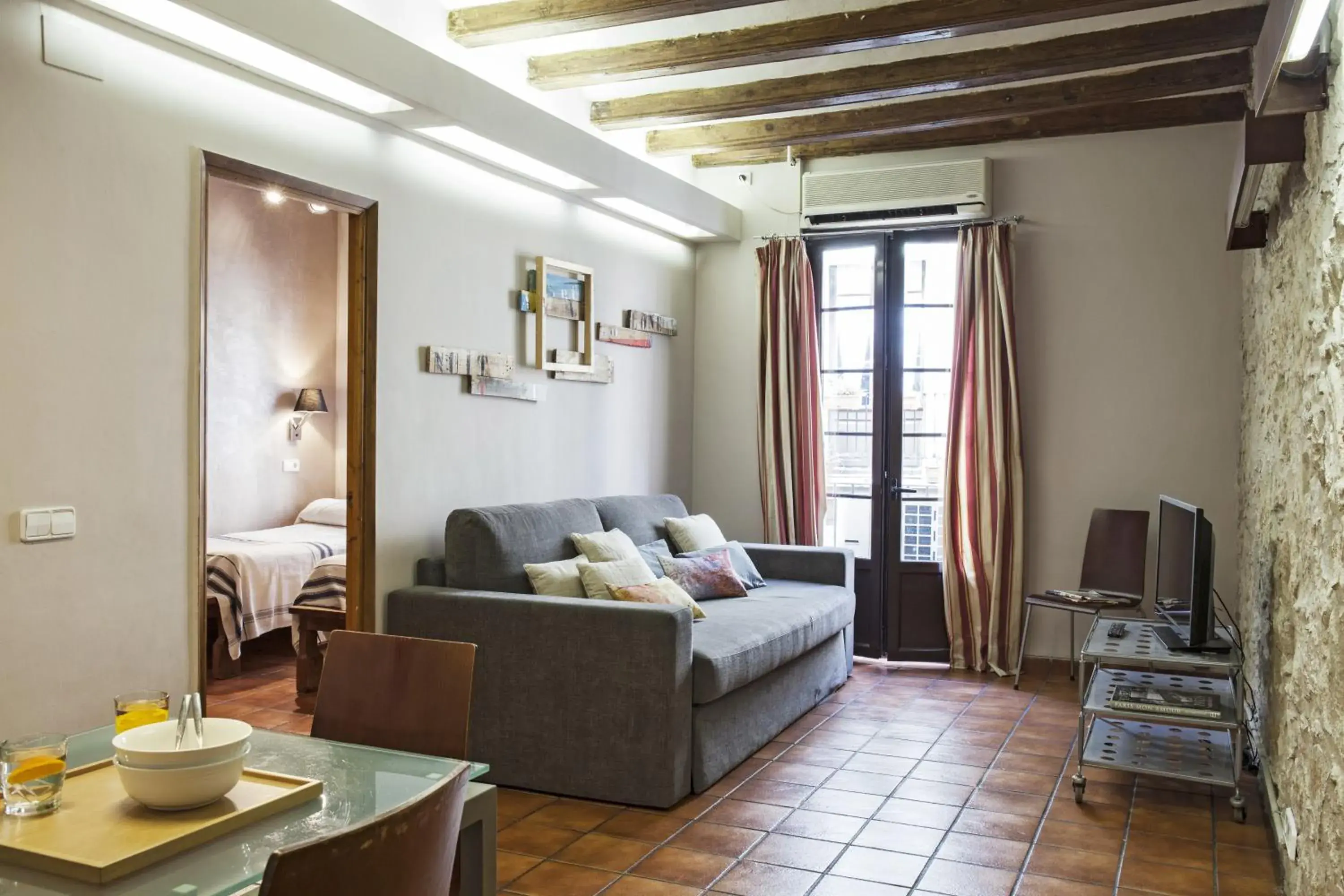 Living room in AinB Las Ramblas-Guardia Apartments Living room in AinB Las Ramblas-Guardia Apartments