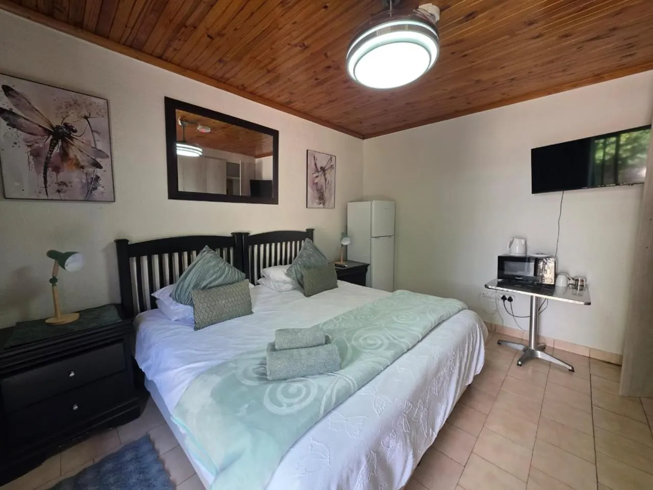 Bed in Aloe Tree Guest House