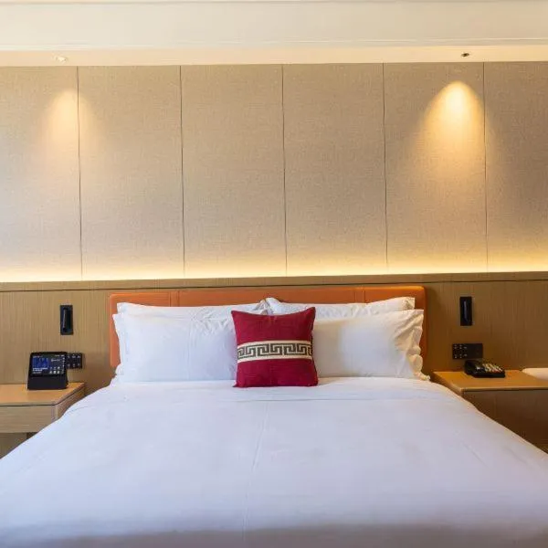 Bed in Ramada Plaza by Wyndham Ezhou Binjiang