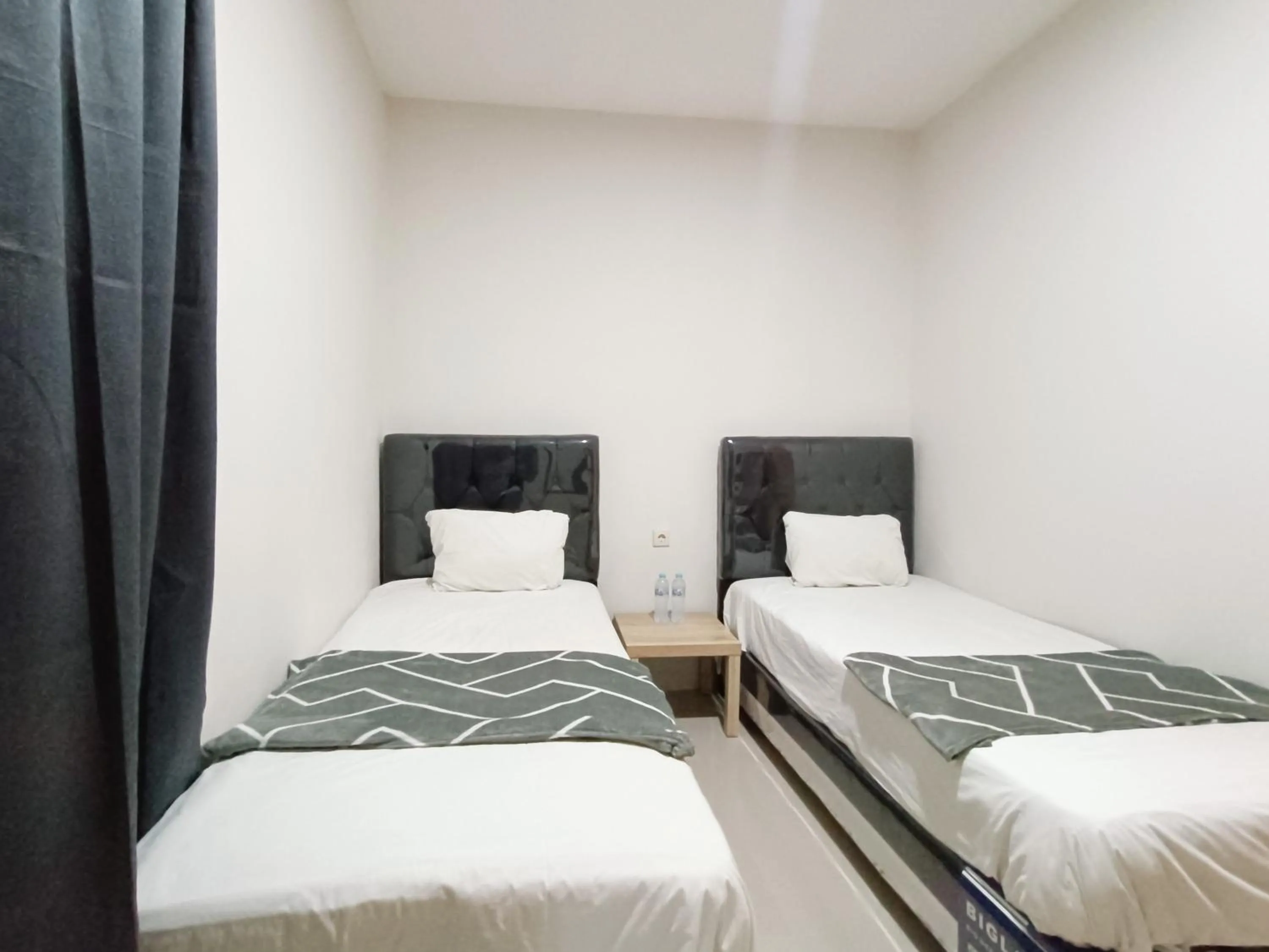 Bedroom, Bed in Happy Family Homestay Jember Mitra RedDoorz