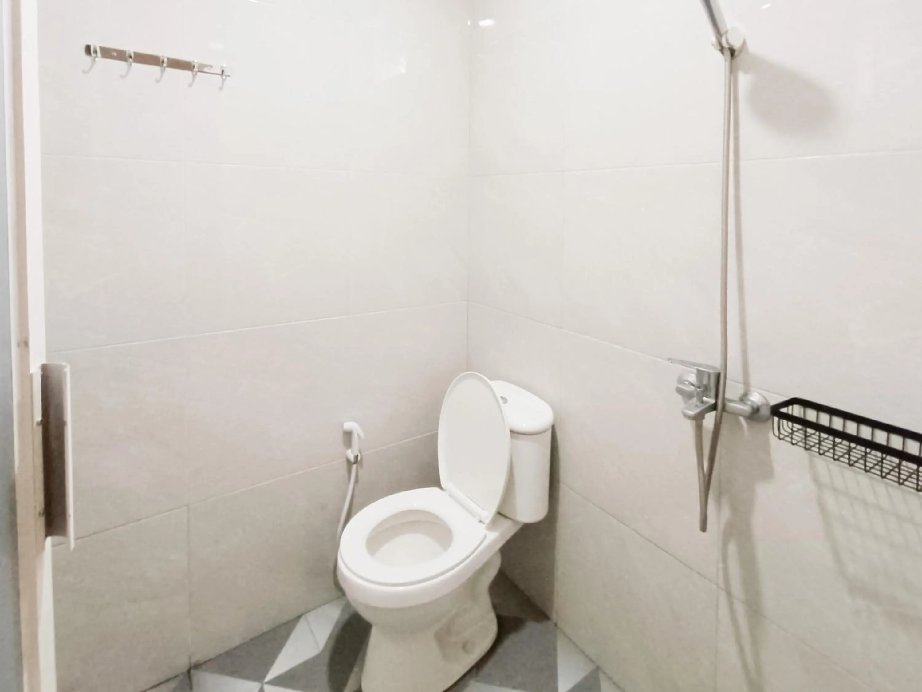 Bathroom in Happy Family Homestay Jember Mitra RedDoorz