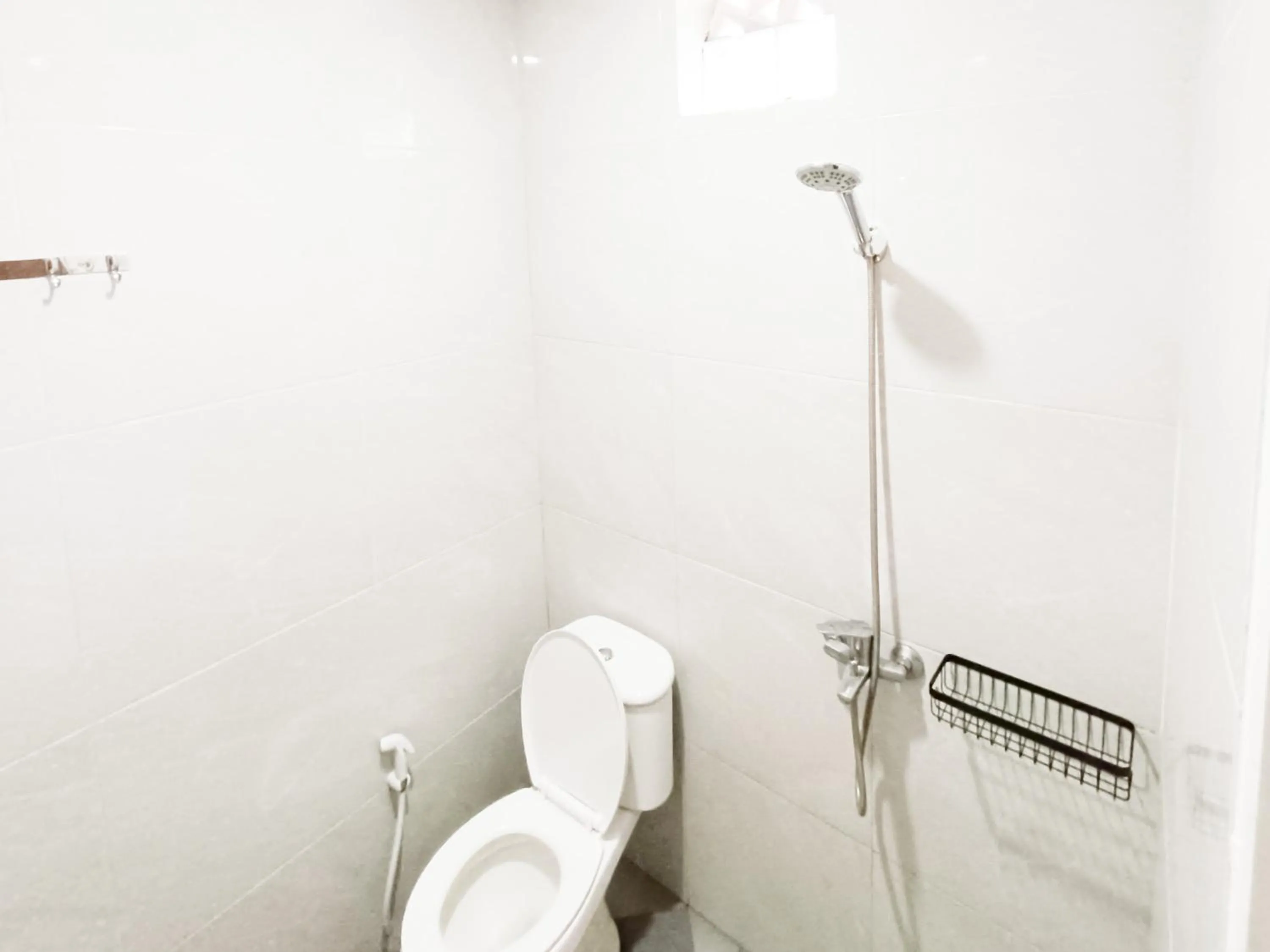 Bathroom in Happy Family Homestay Jember Mitra RedDoorz