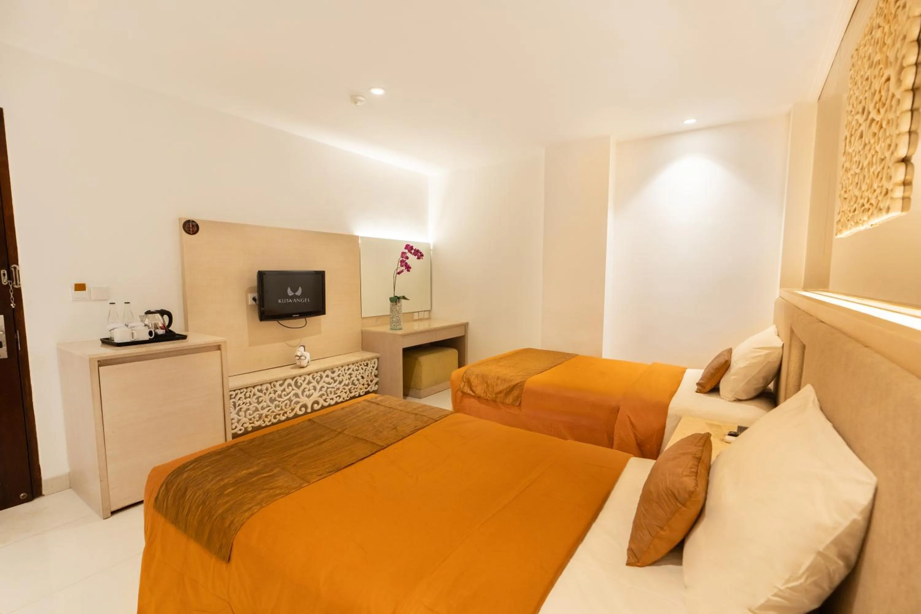 Photo of the whole room, Bed in Kuta Angel Hotel