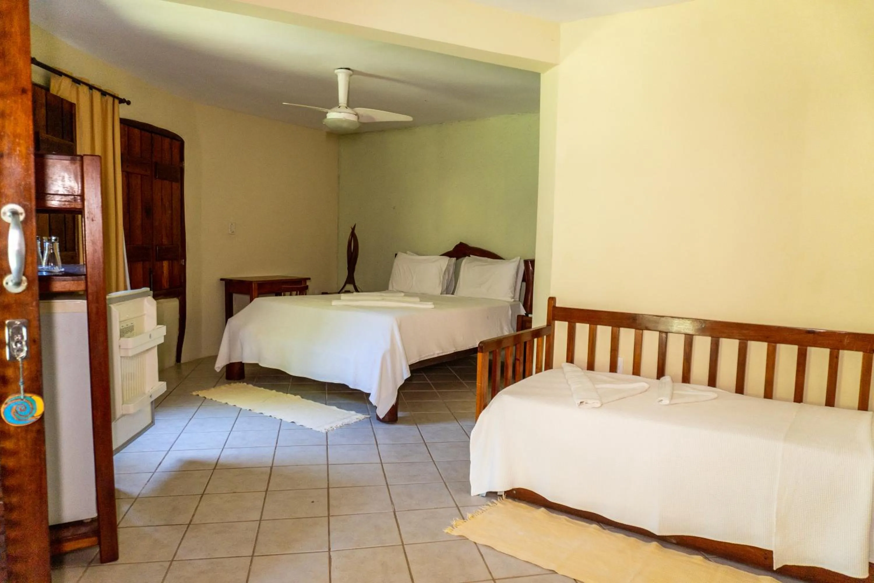 Bed in Pousada Maré Alta