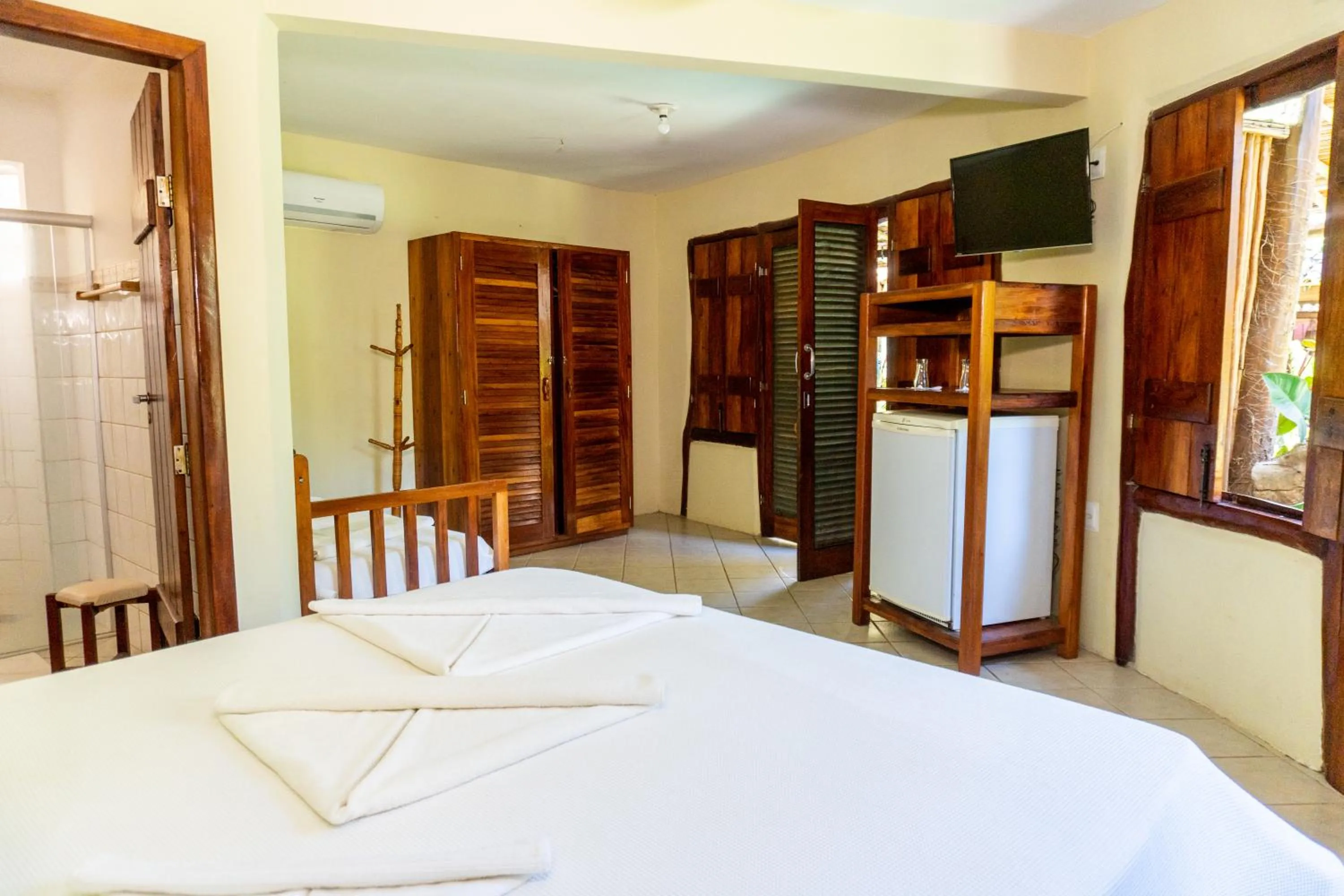 Bed in Pousada Maré Alta