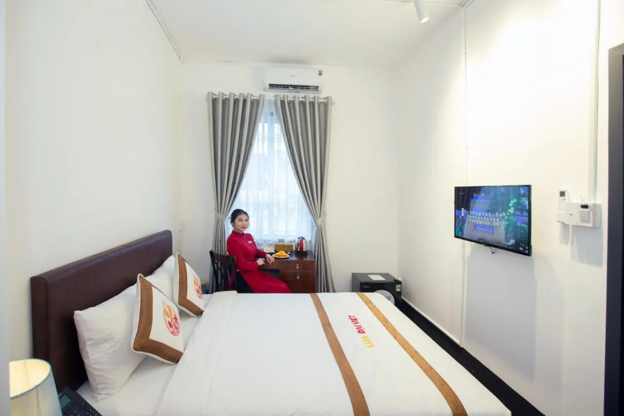 Bed in THE RICE HOTEL Nong Thon Dai Viet 131 Bui Vien