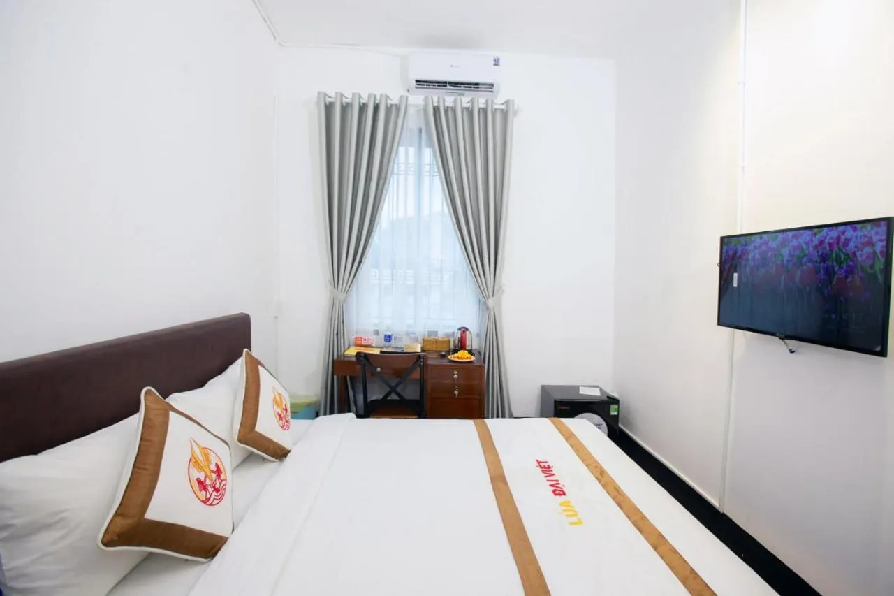 Bed in THE RICE HOTEL Nong Thon Dai Viet 131 Bui Vien