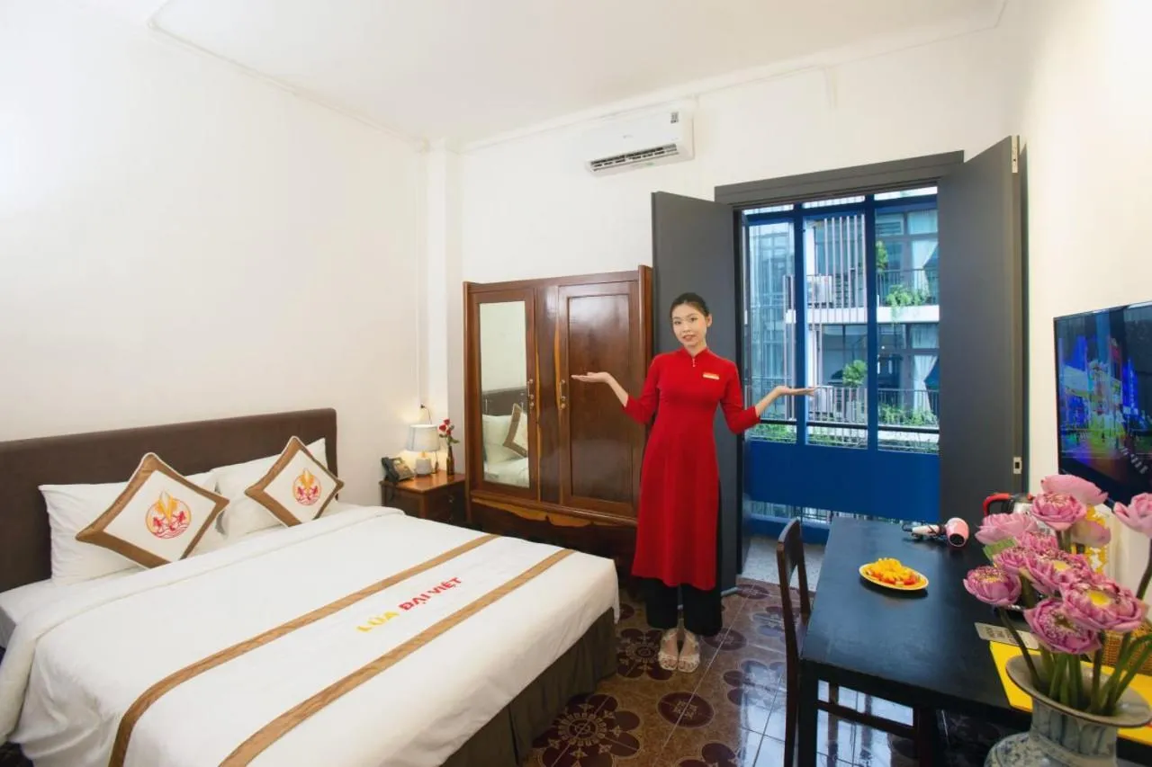 Bed in THE RICE HOTEL Nong Thon Dai Viet 131 Bui Vien