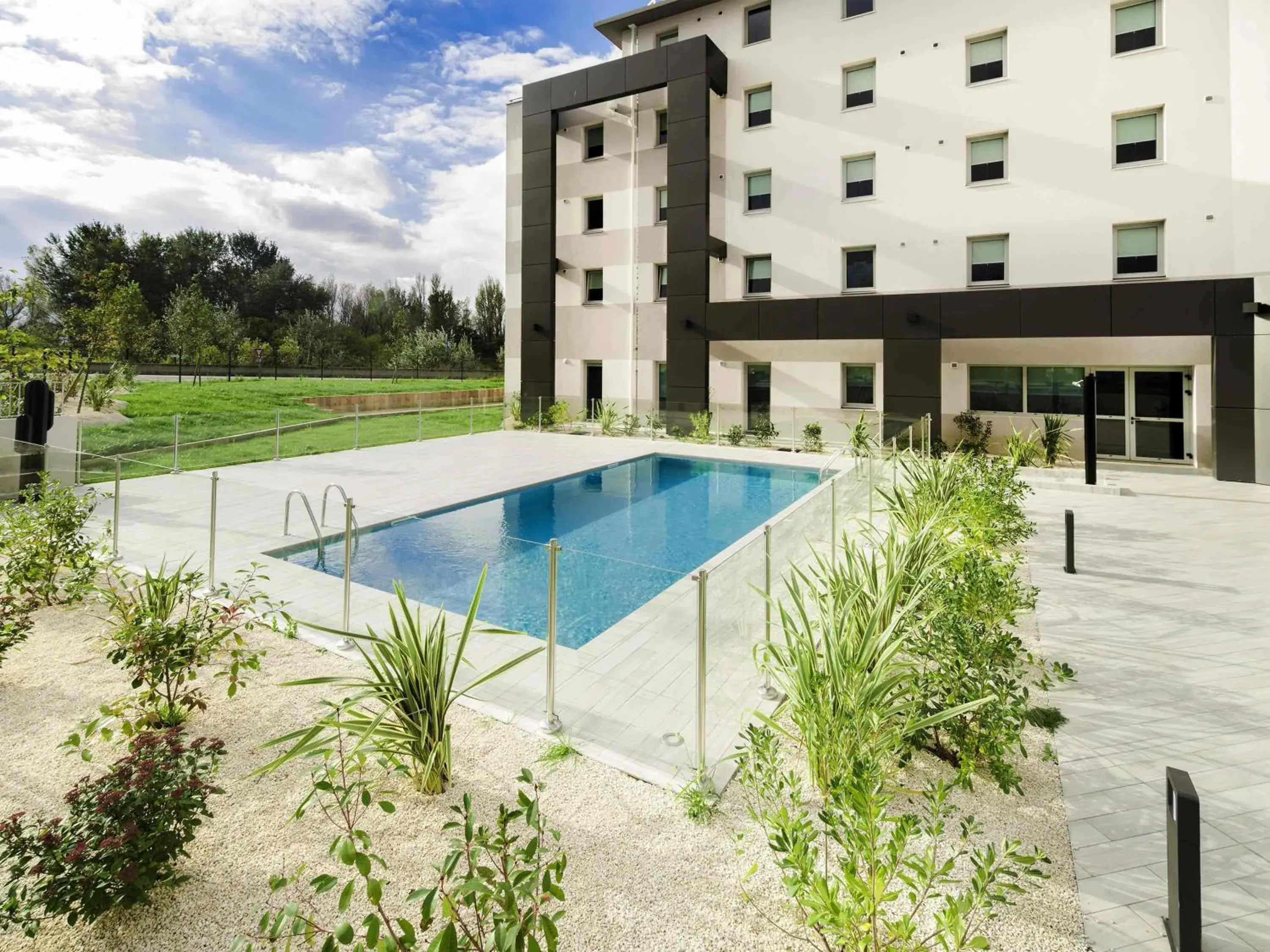 Pool view in Ibis Budget Valence Sud Pool view in Ibis Budget Valence Sud