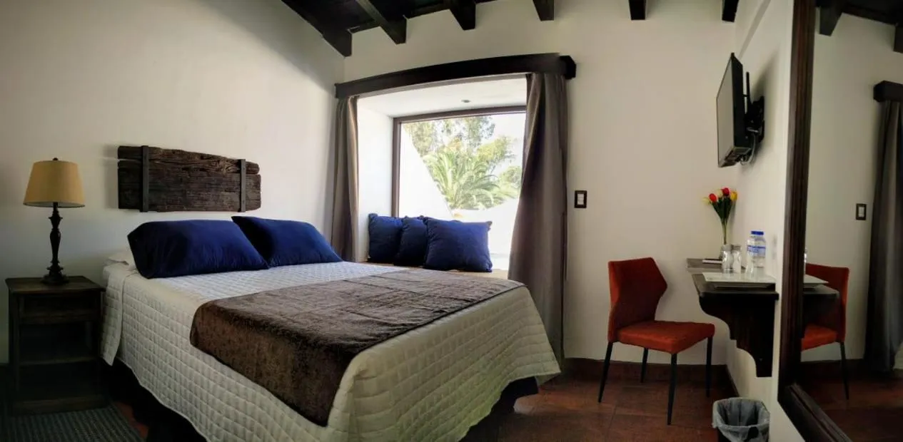 Bed in Hotel Posada de la Luna