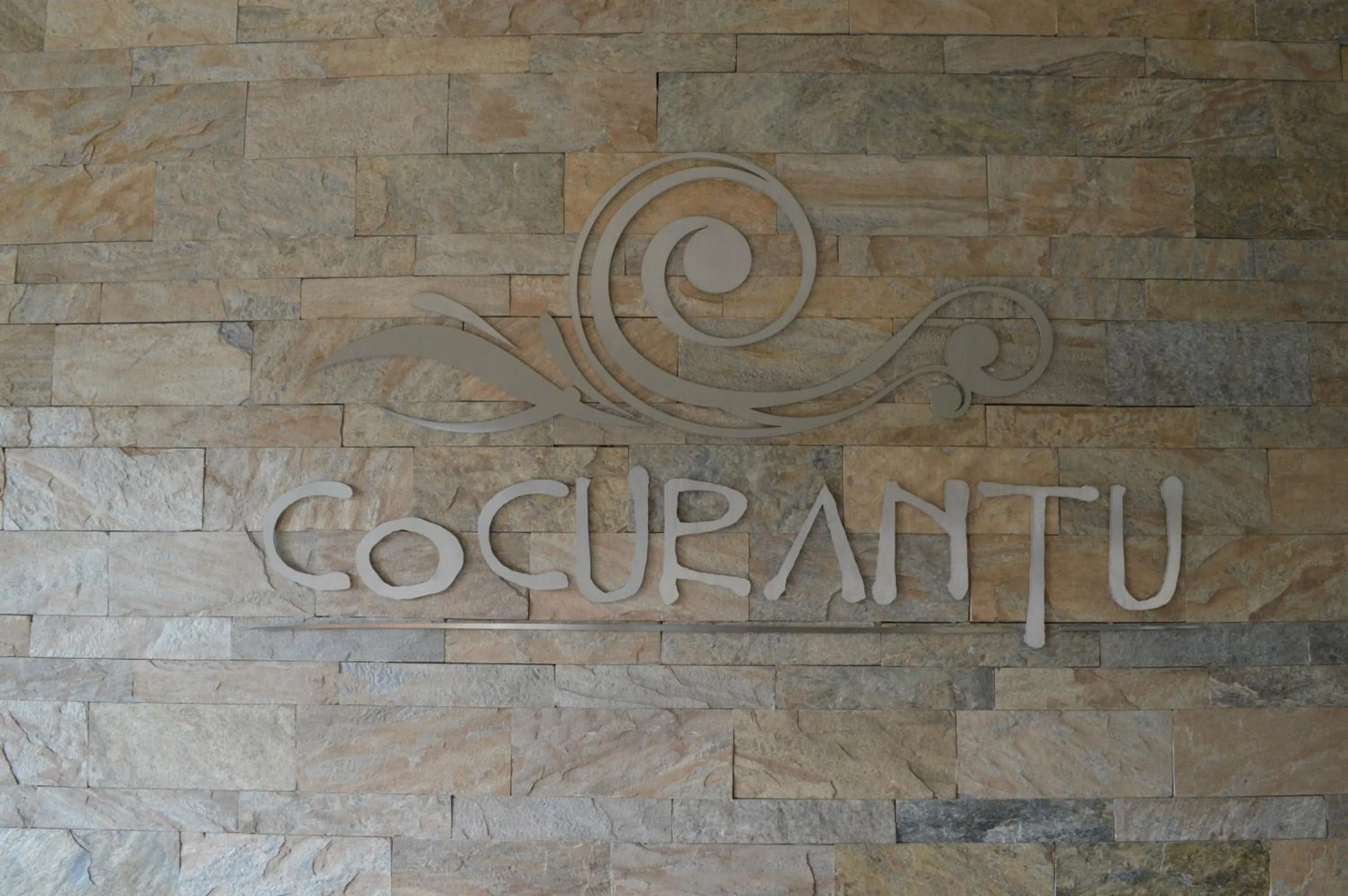 Property logo or sign in Cocurantu Hotel Boutique