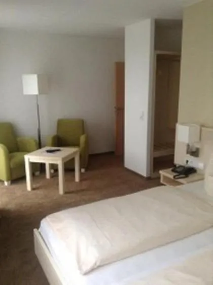Photo of the whole room, Bed in Waldhotel Dornröschenshöh