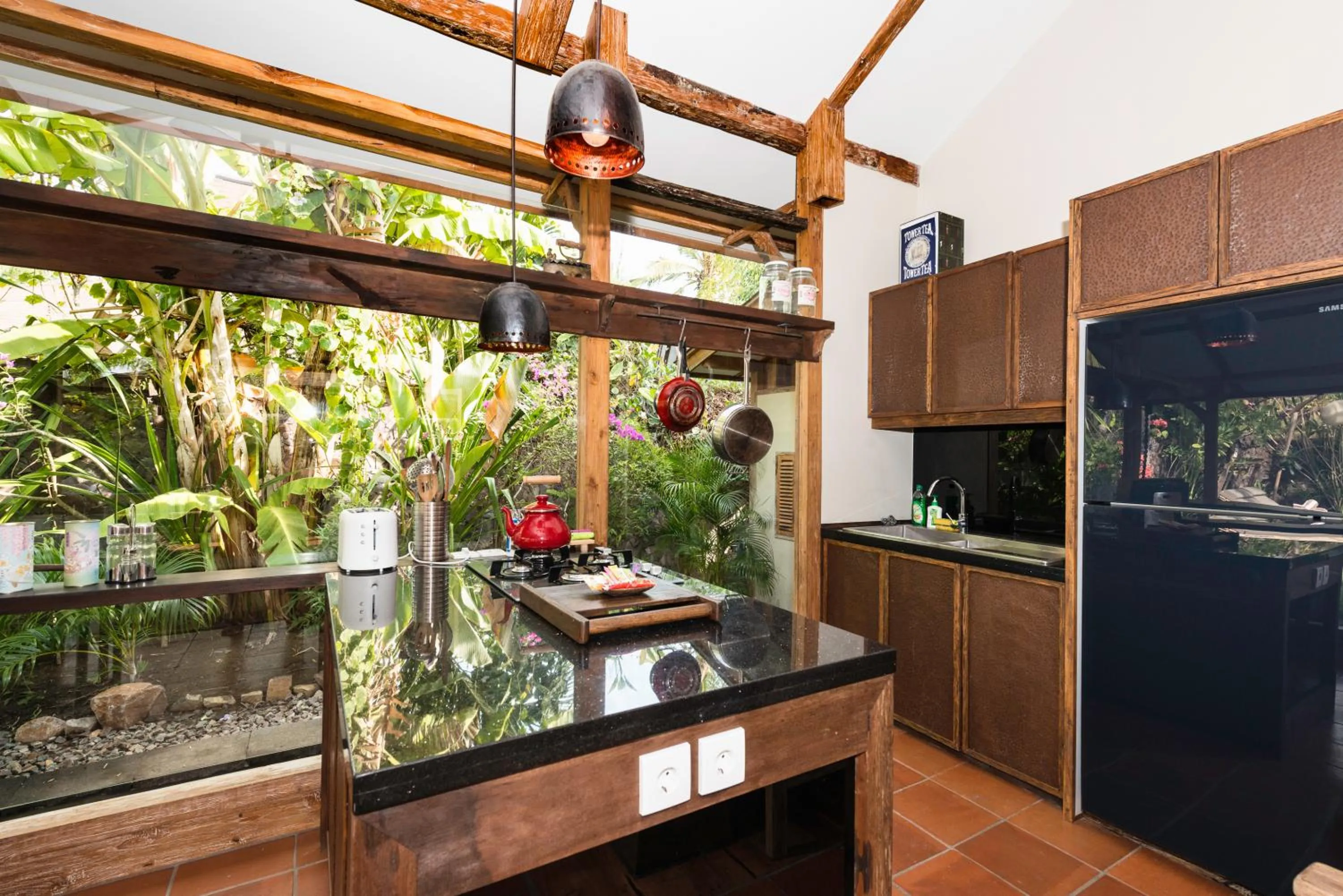 Kitchen or kitchenette in Villa Bhuvana with private swimming pool