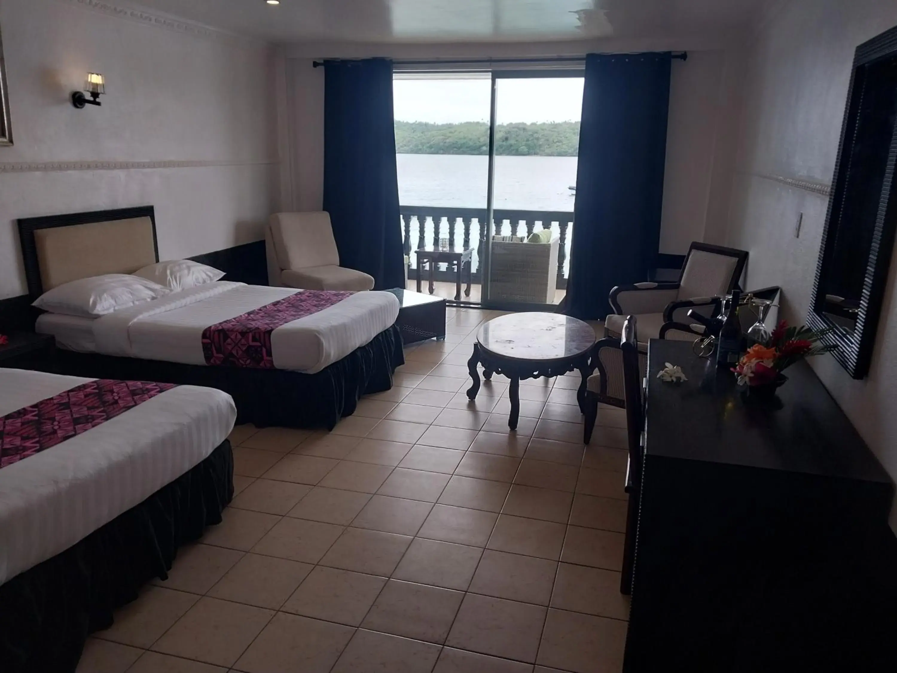 Deluxe Double Room with Balcony and Sea View in Puataukanave International Hotel Deluxe Double Room with Balcony and Sea View in Puataukanave International Hotel