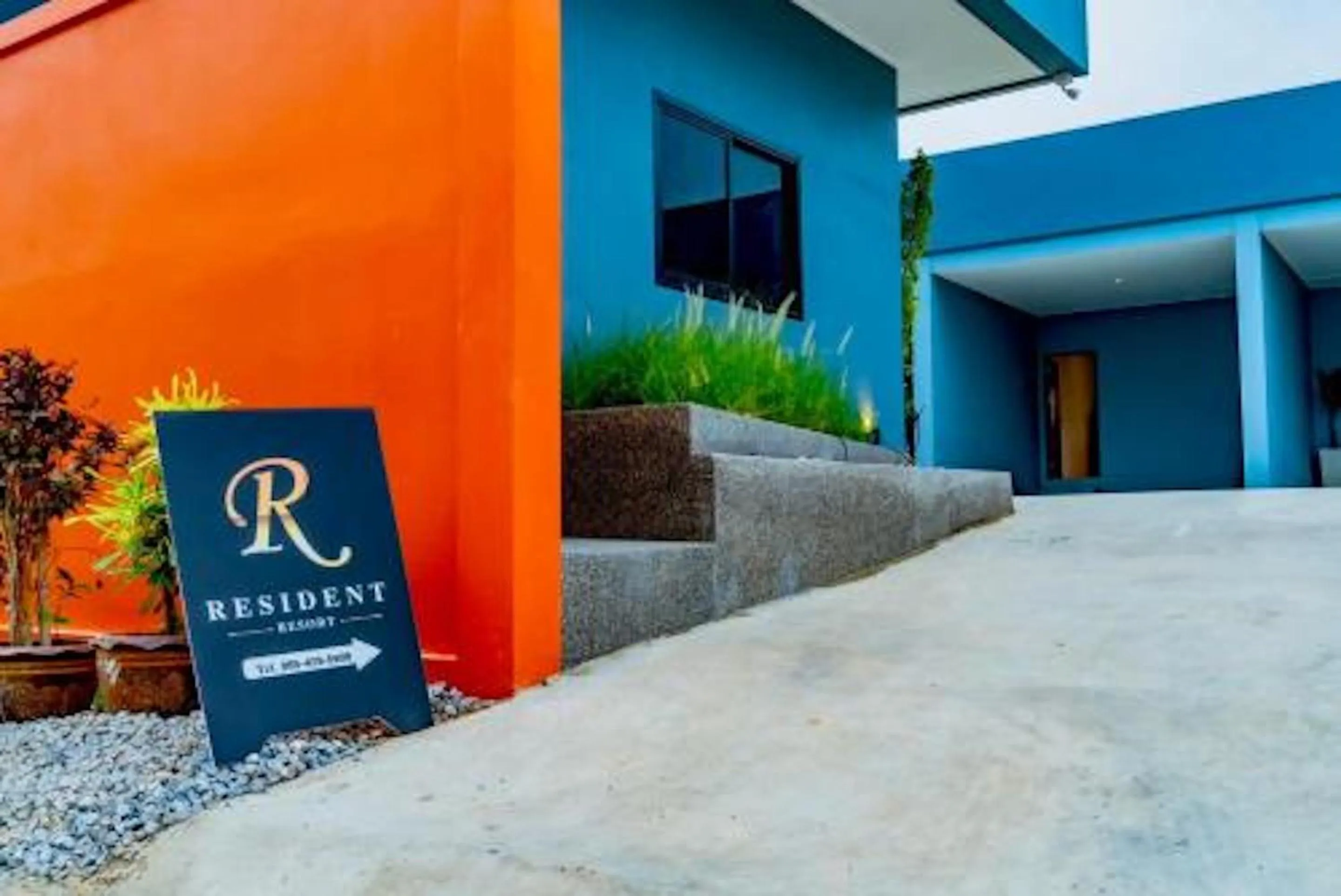 Property logo or sign in R resident resort