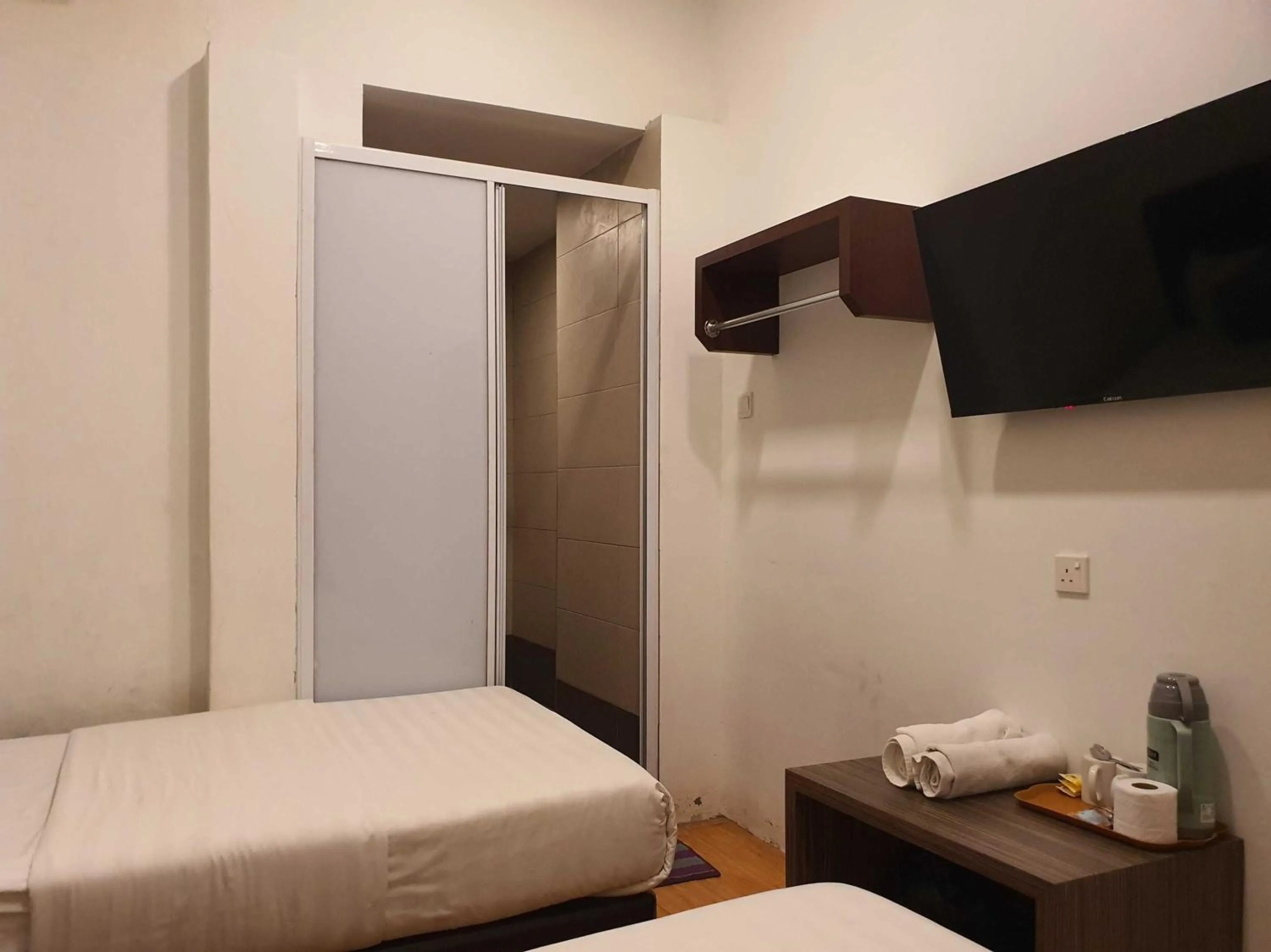 Bedroom in Hotel O Signature Inn Miri