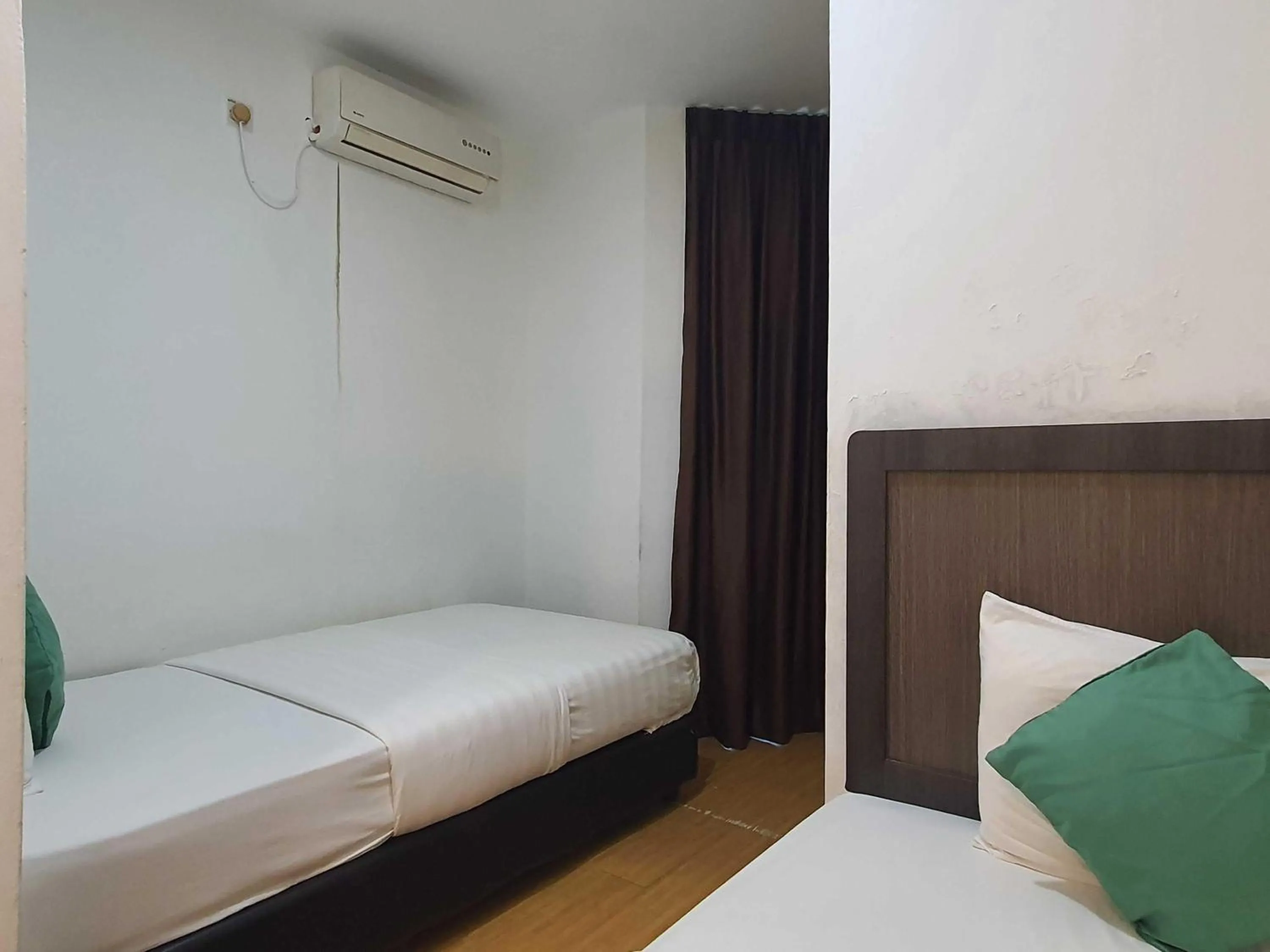 Bedroom in Hotel O Signature Inn Miri