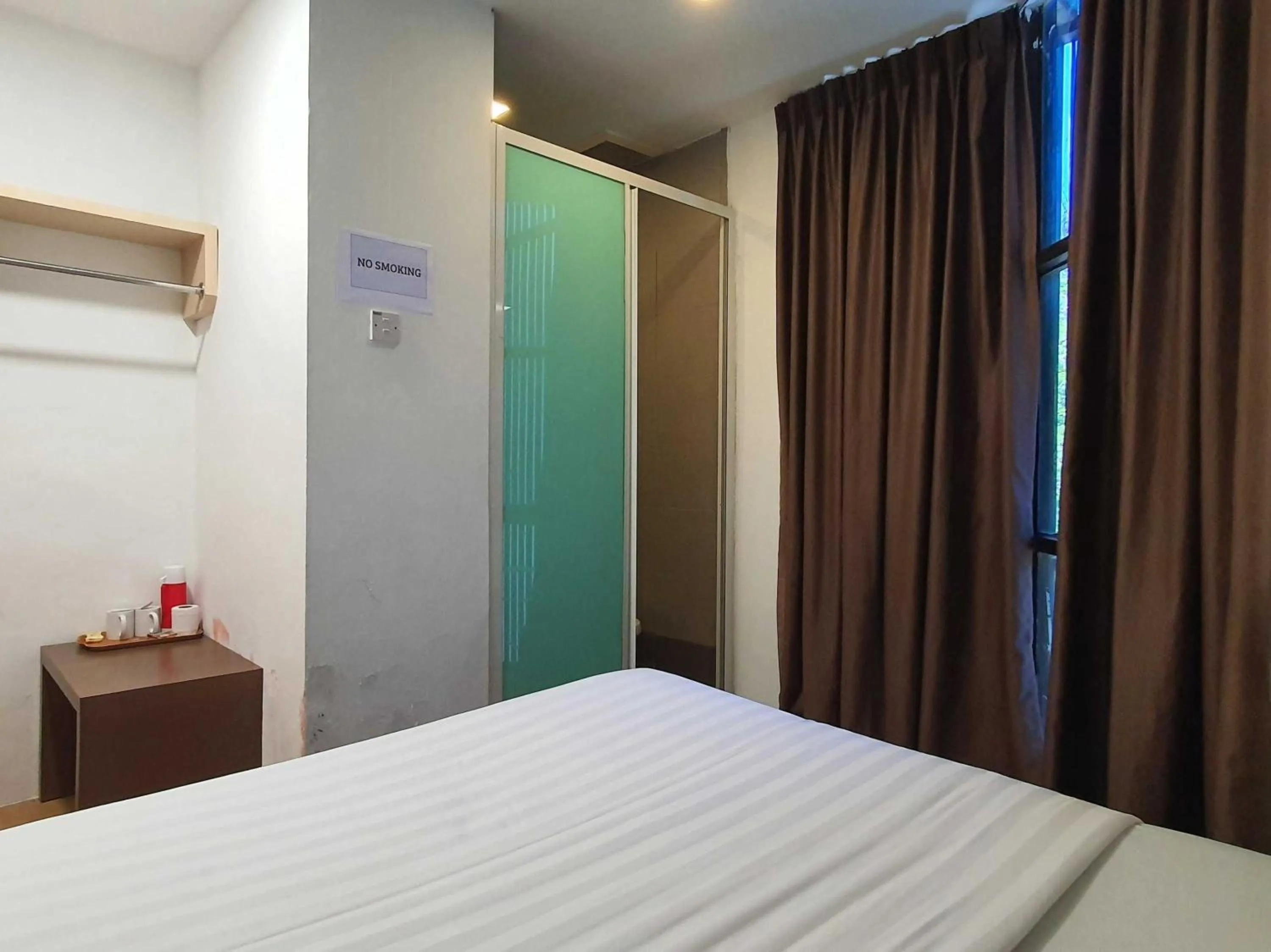 Bedroom in Hotel O Signature Inn Miri