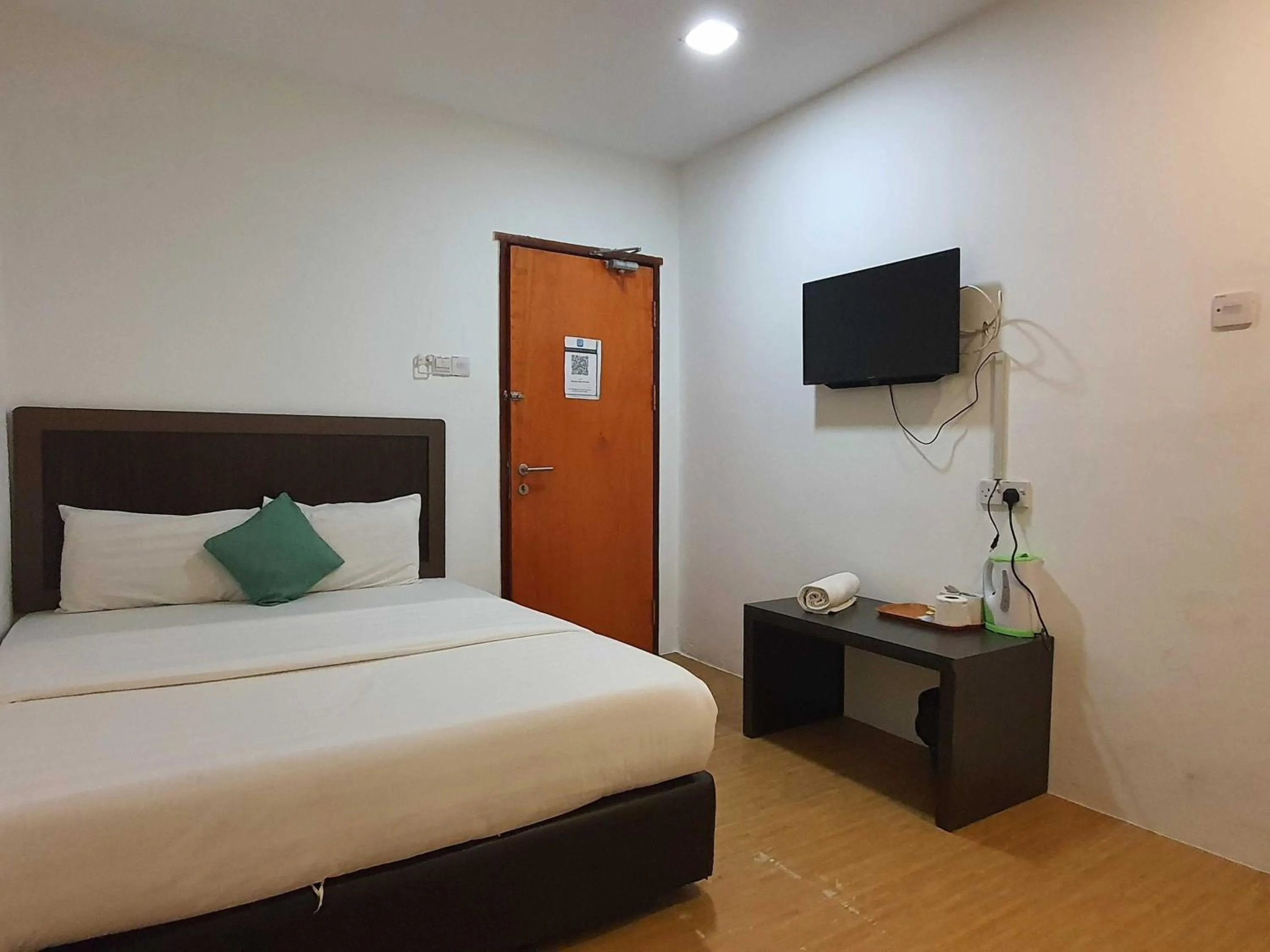 Bedroom in Hotel O Signature Inn Miri