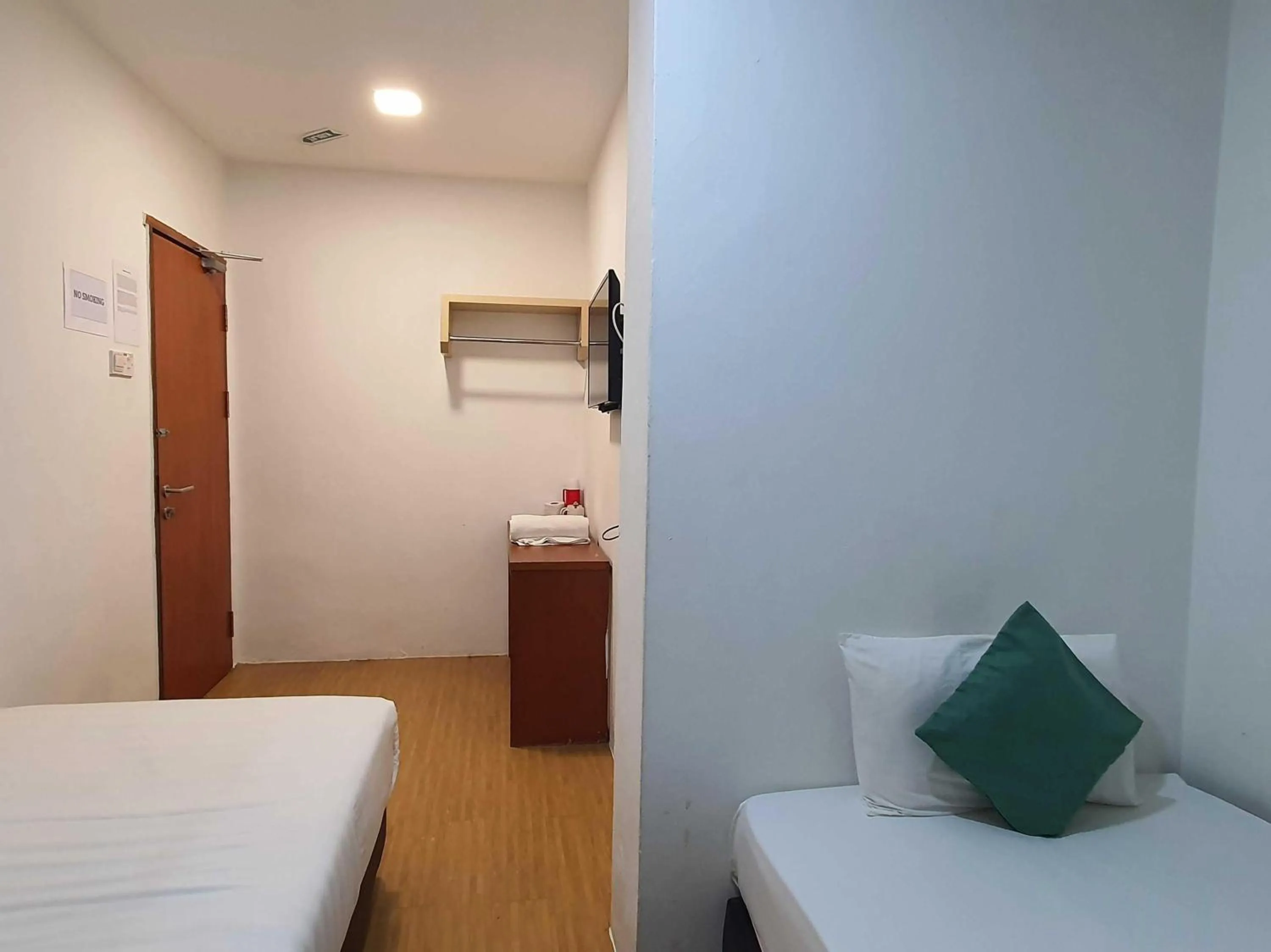 Bedroom in Hotel O Signature Inn Miri