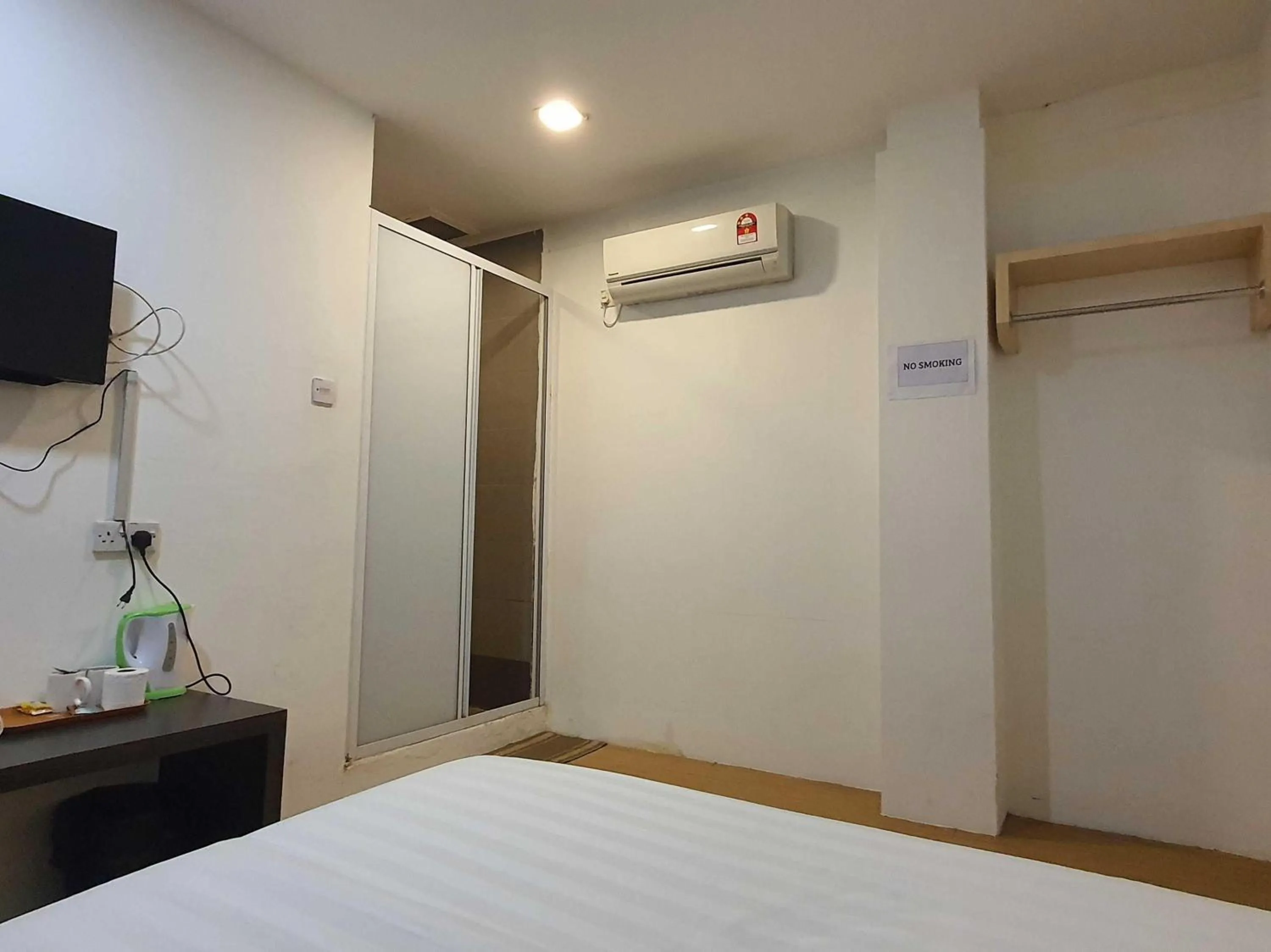 Bedroom in Hotel O Signature Inn Miri