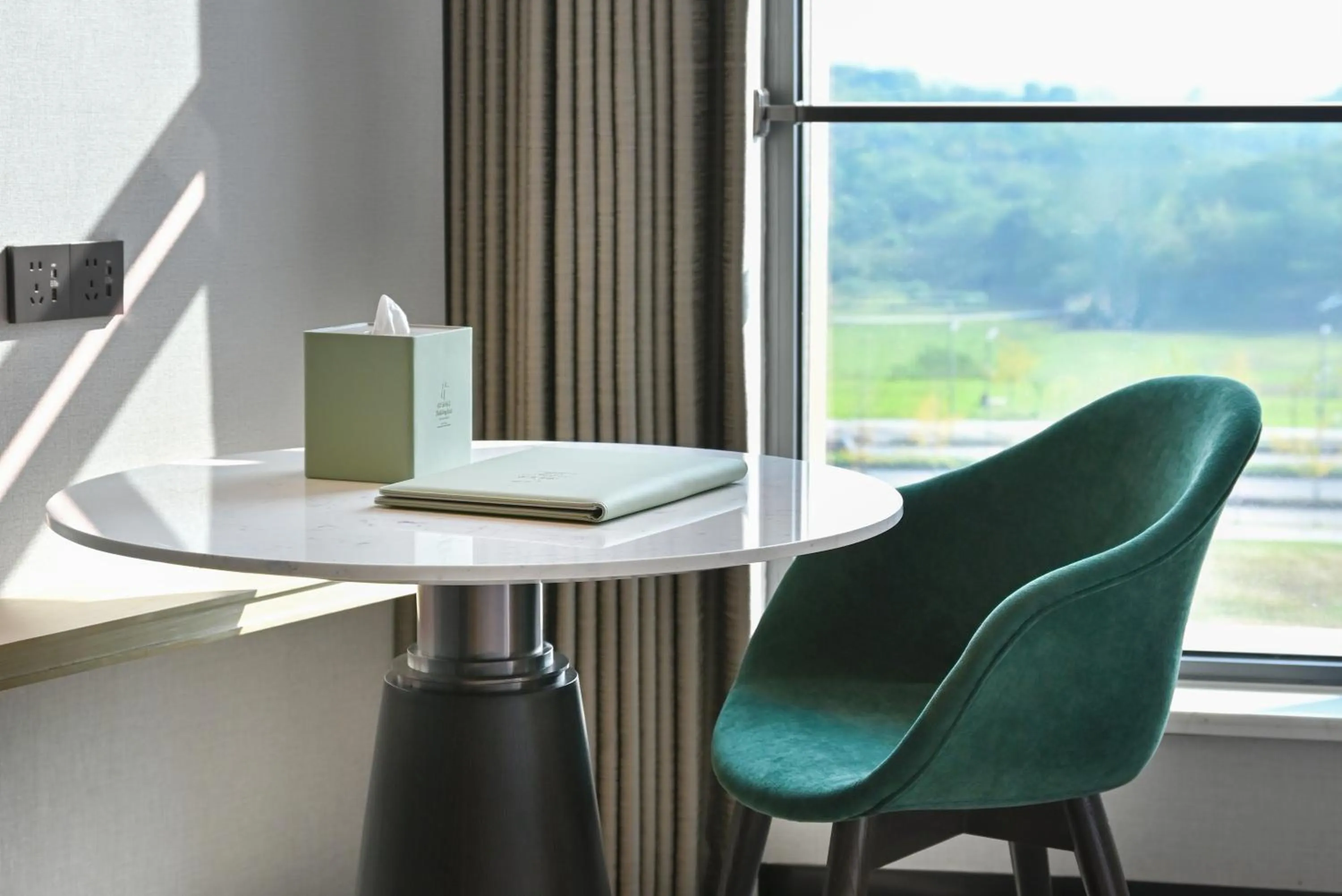 Seating area in Holiday Inn Chongqing Science Hall by IHG