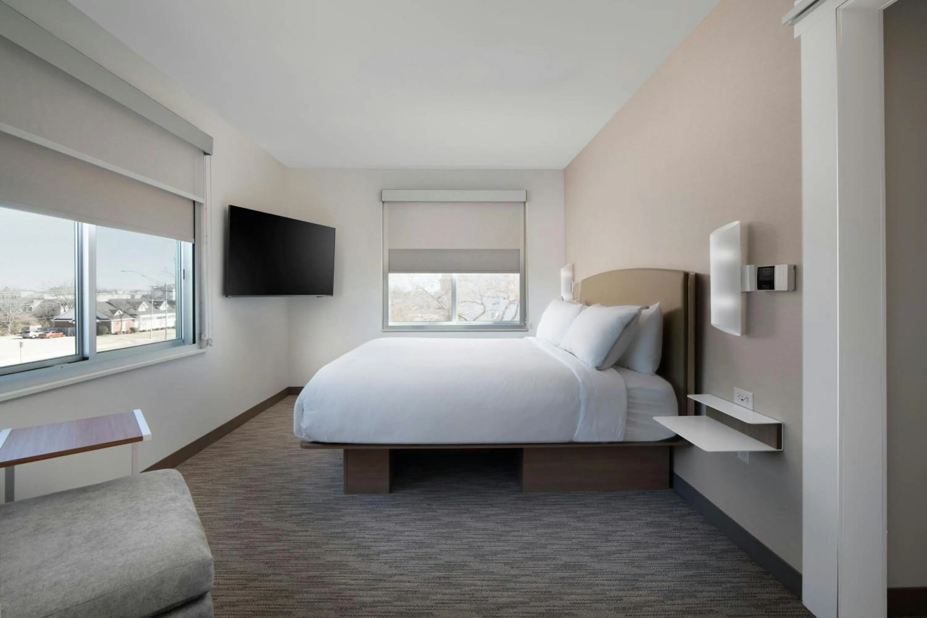 Photo of the whole room, Bed in Element Fort Smith