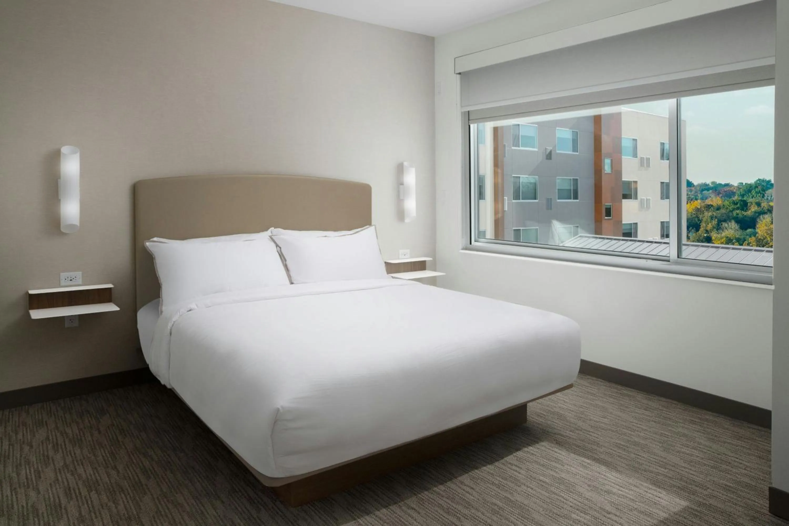 Photo of the whole room, Bed in Element Fort Smith