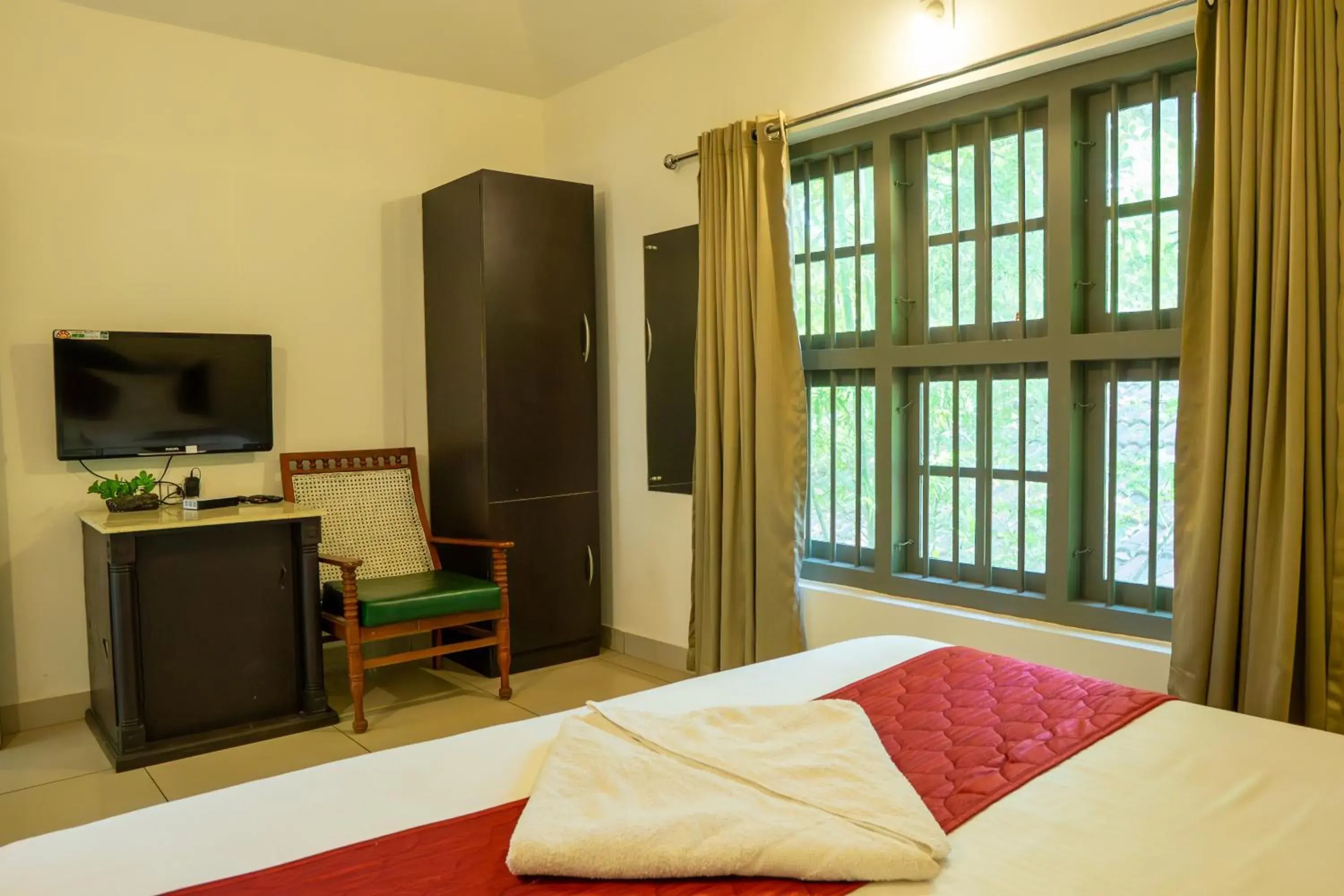 TV and multimedia, Bed in Wayanad Ranches Resorts TV and multimedia, Bed in Wayanad Ranches Resorts