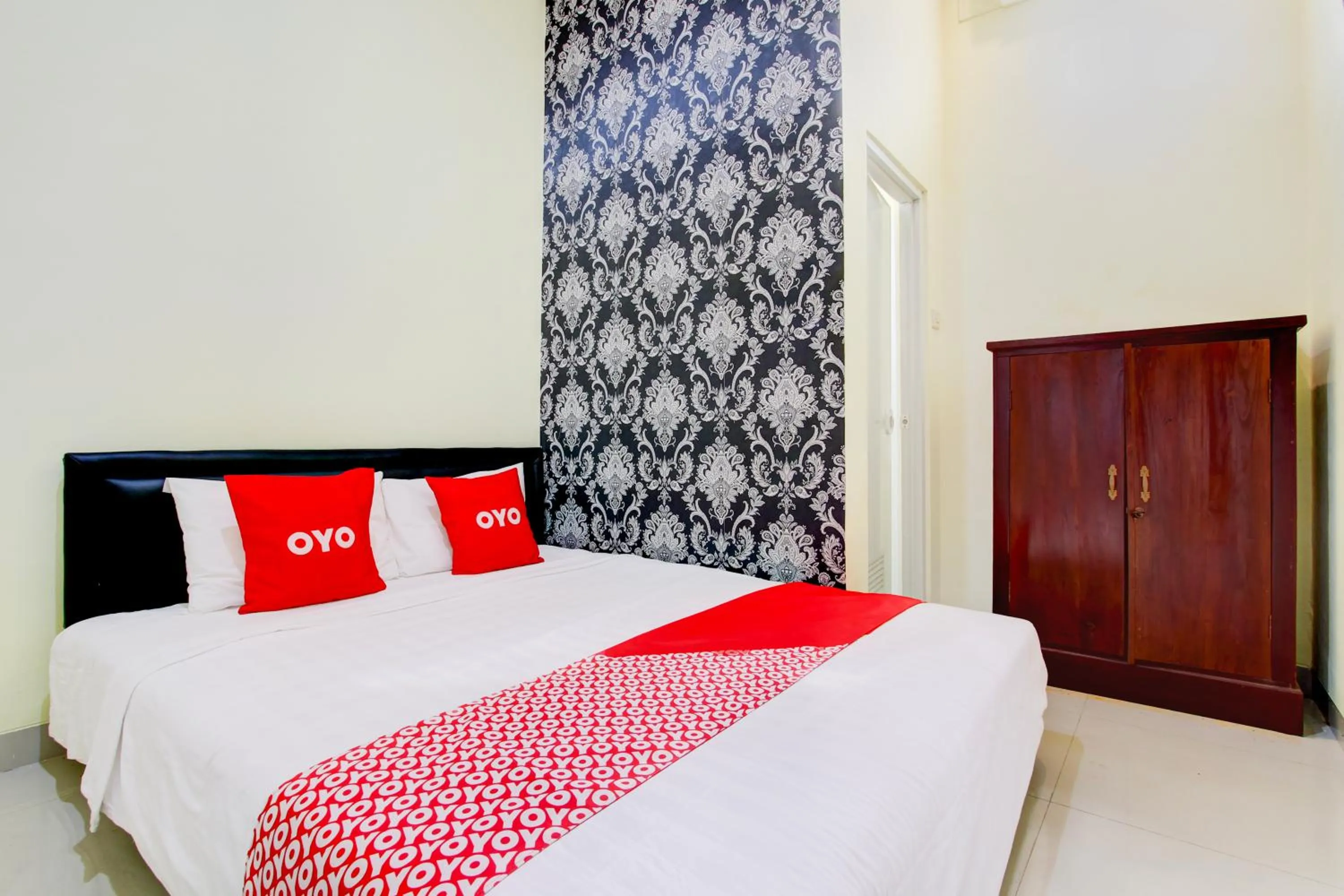 Photo of the whole room, Bed in Hotel O Sleman Near Bandara Adi Sutjipto Formerly Joglo Sorogenen