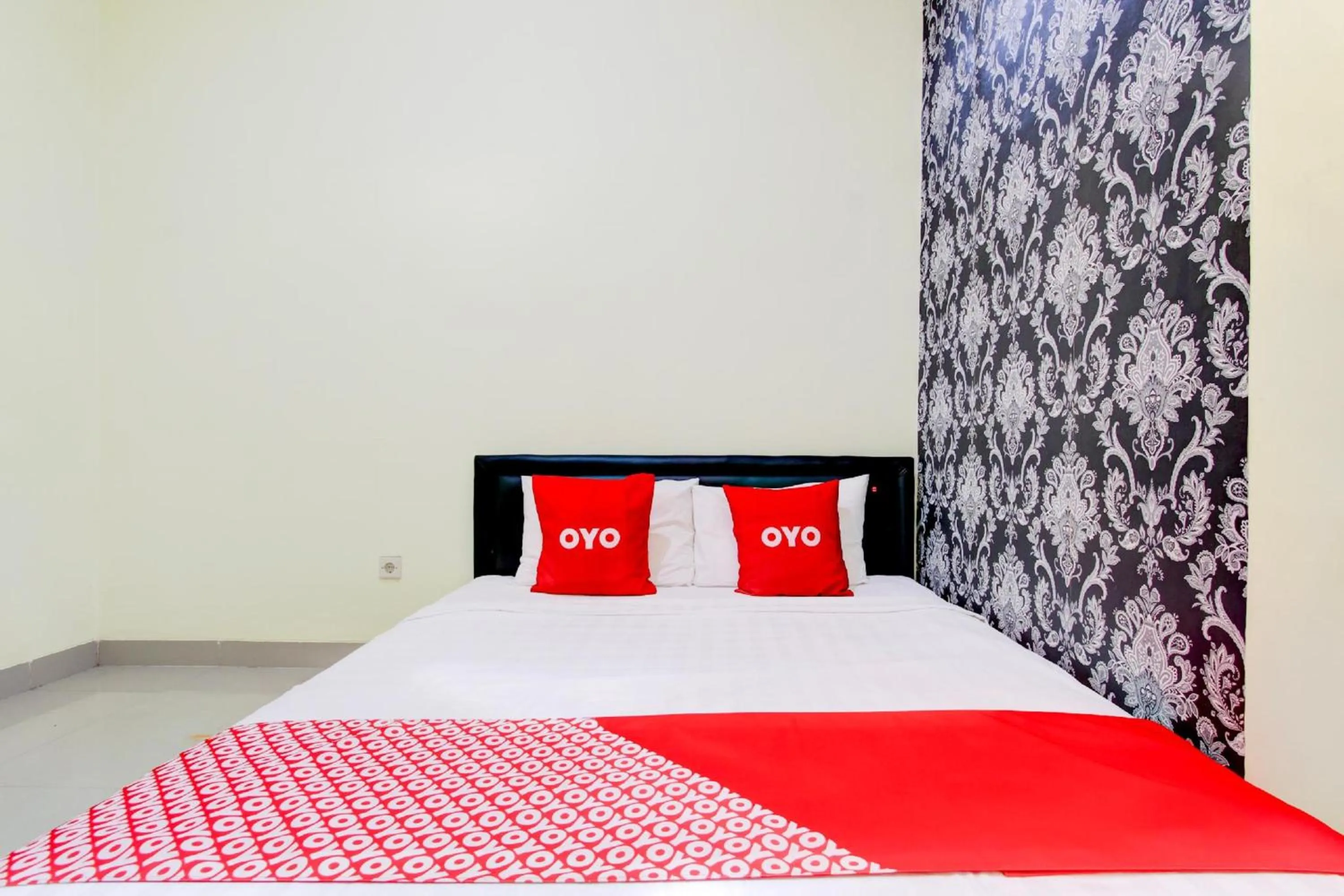 View (from property/room), Bed in Hotel O Sleman Near Bandara Adi Sutjipto Formerly Joglo Sorogenen