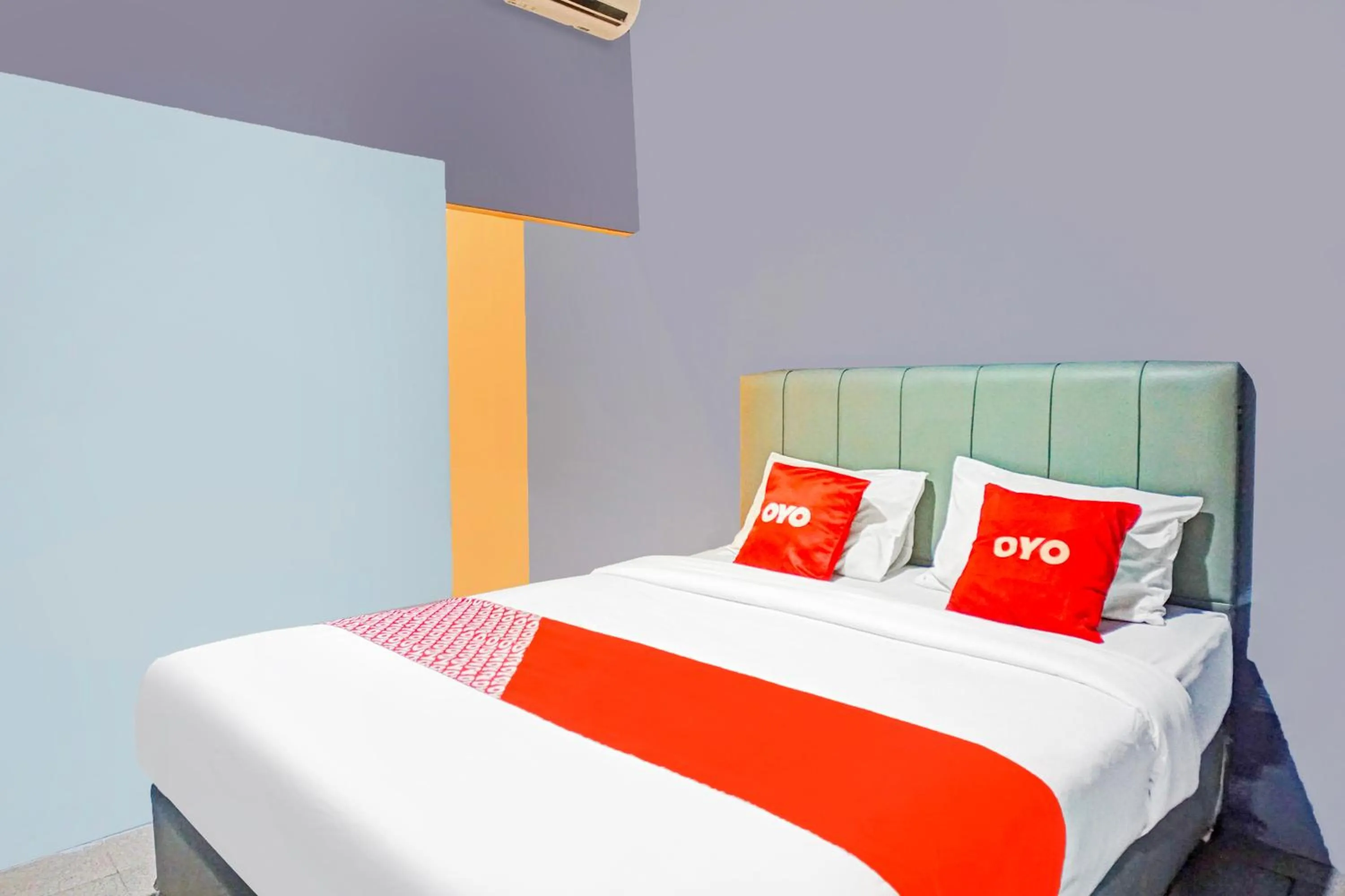 Bed in Hotel O Mandala Near Universitas Negeri Medan ( UNIMED )