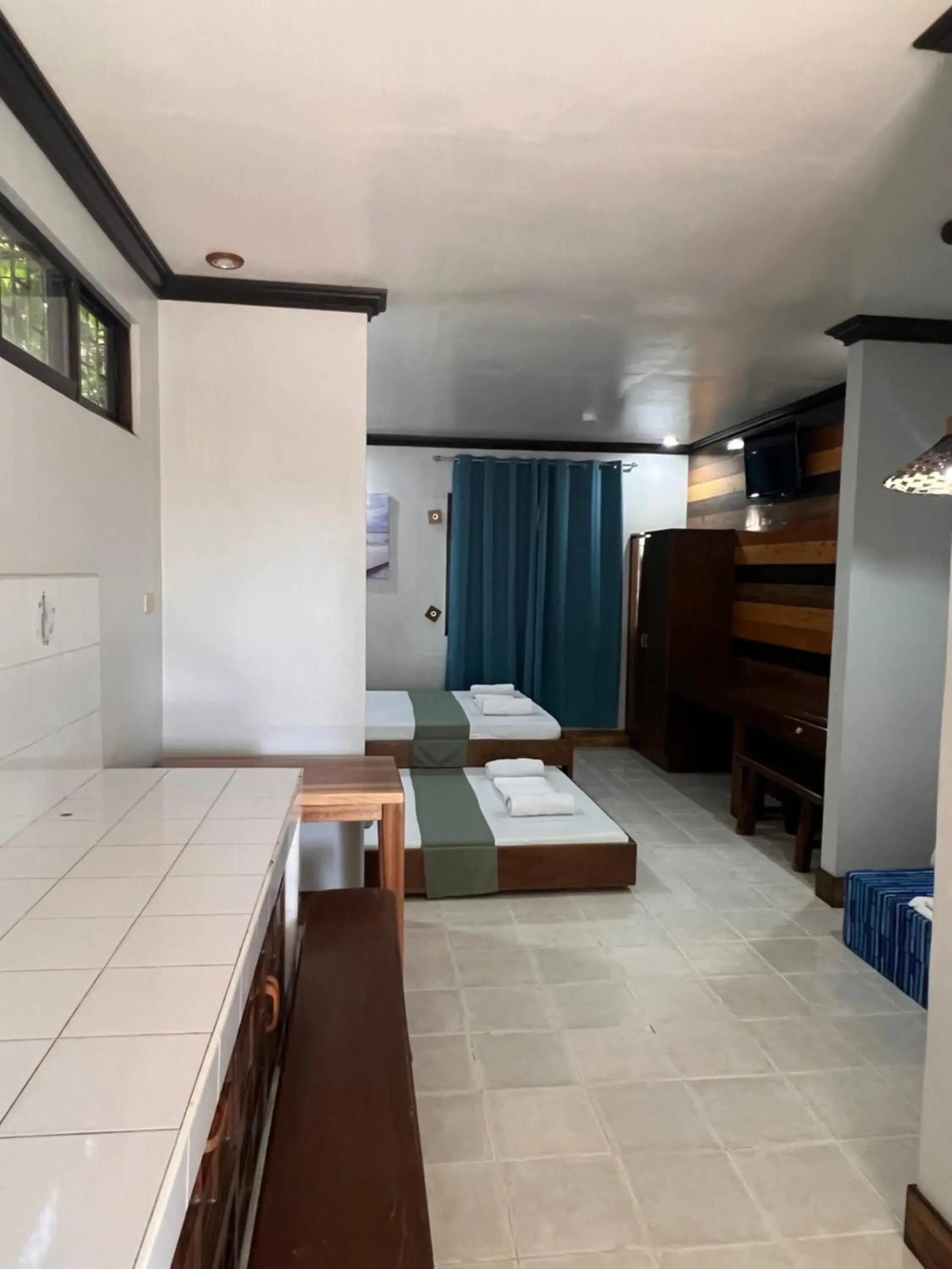 Bedroom in Mendelluke Suites Bedroom in Mendelluke Suites