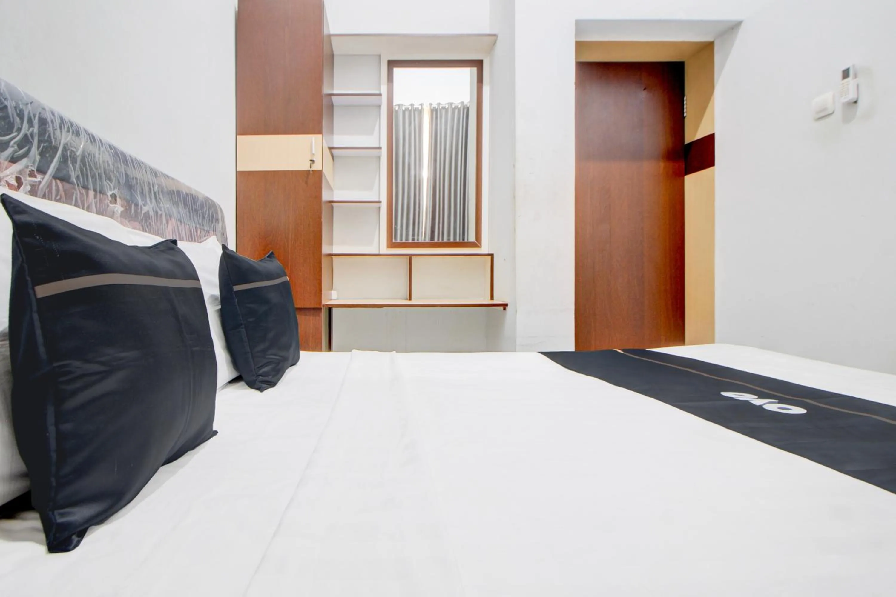 Bedroom, Bed in Capital O 94314 Sunny Co Living