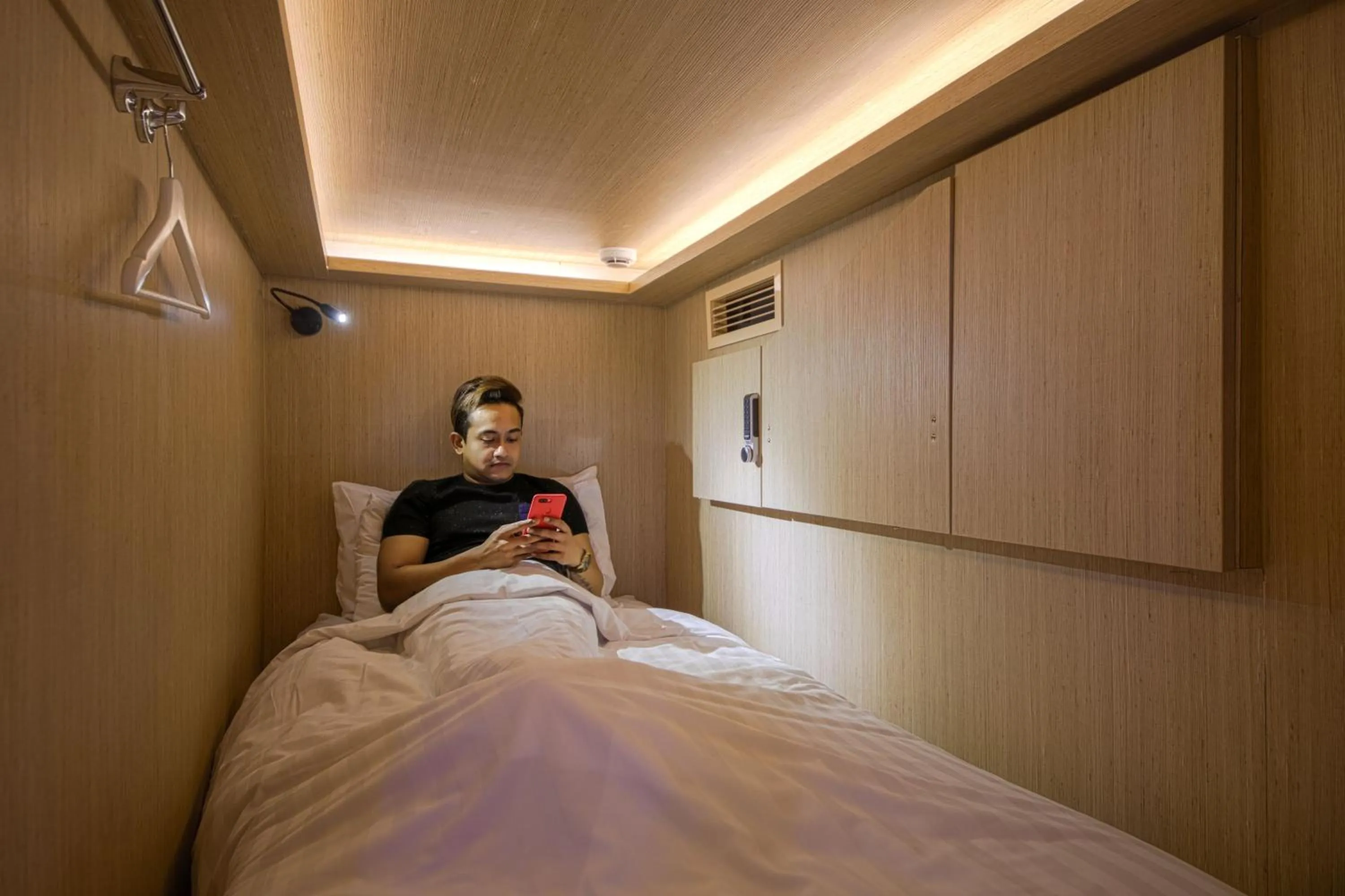 Bed in CUBE Boutique Capsule Hotel at Kampong Glam