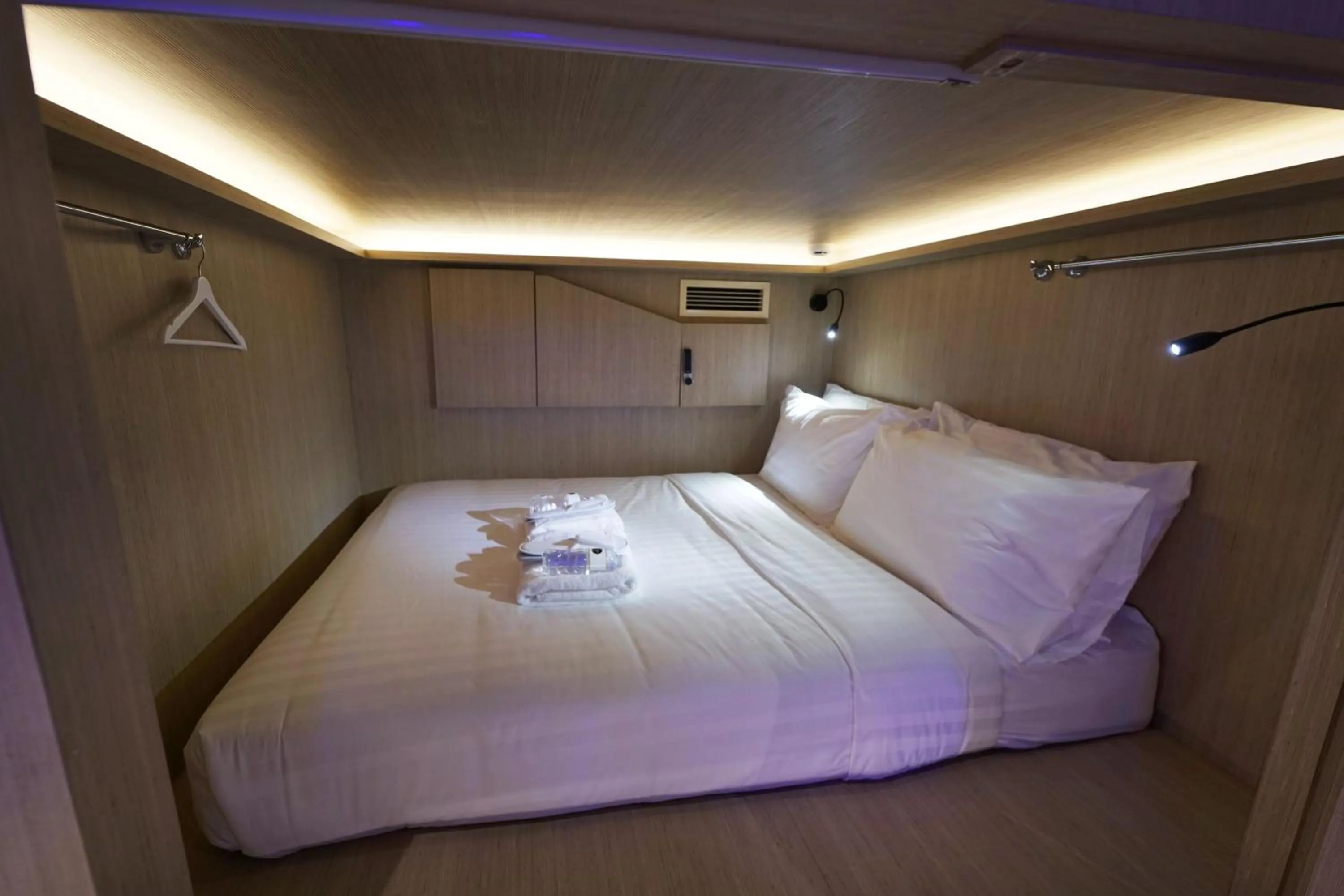 Bed in CUBE Boutique Capsule Hotel at Kampong Glam