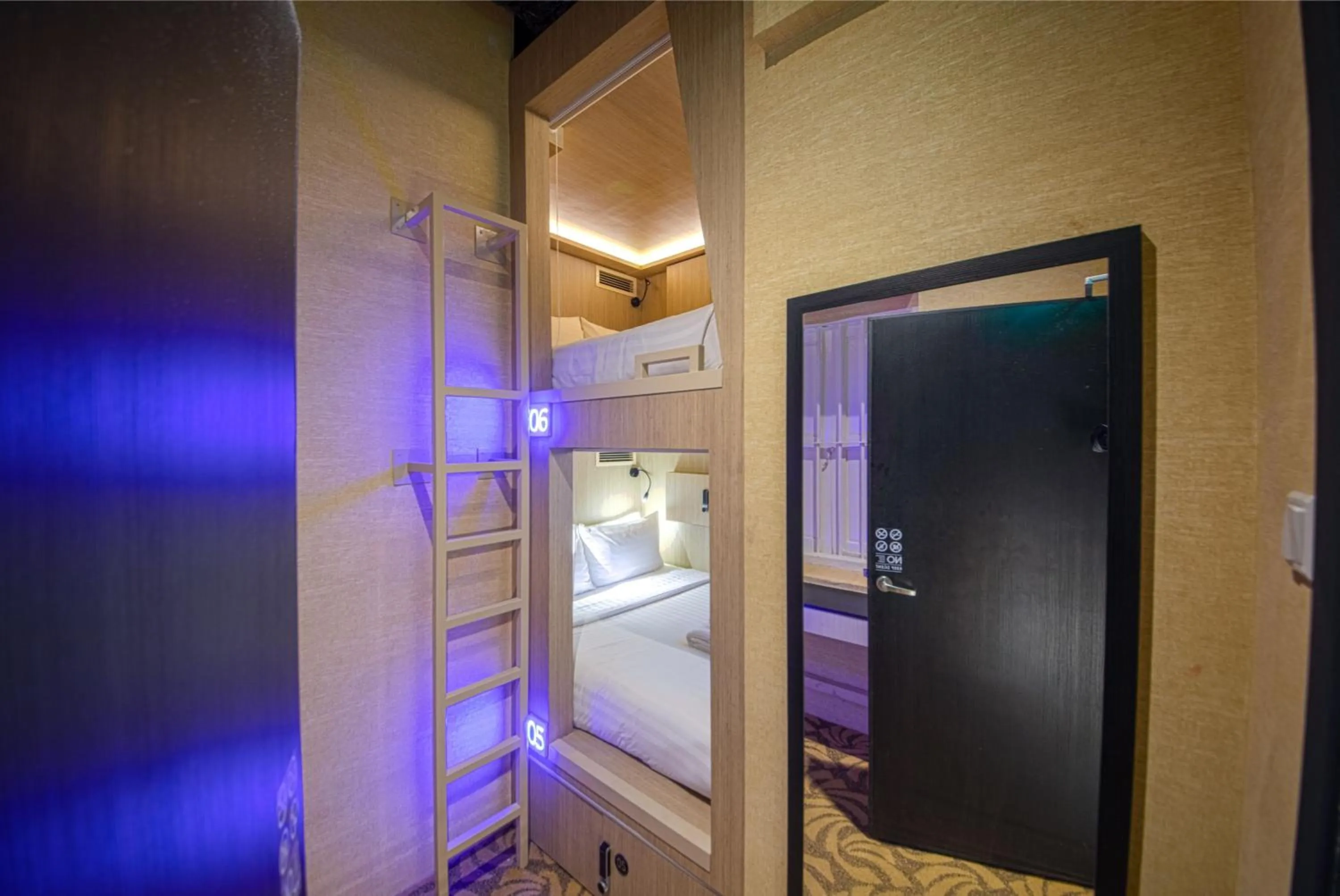 Bed in CUBE Boutique Capsule Hotel at Kampong Glam