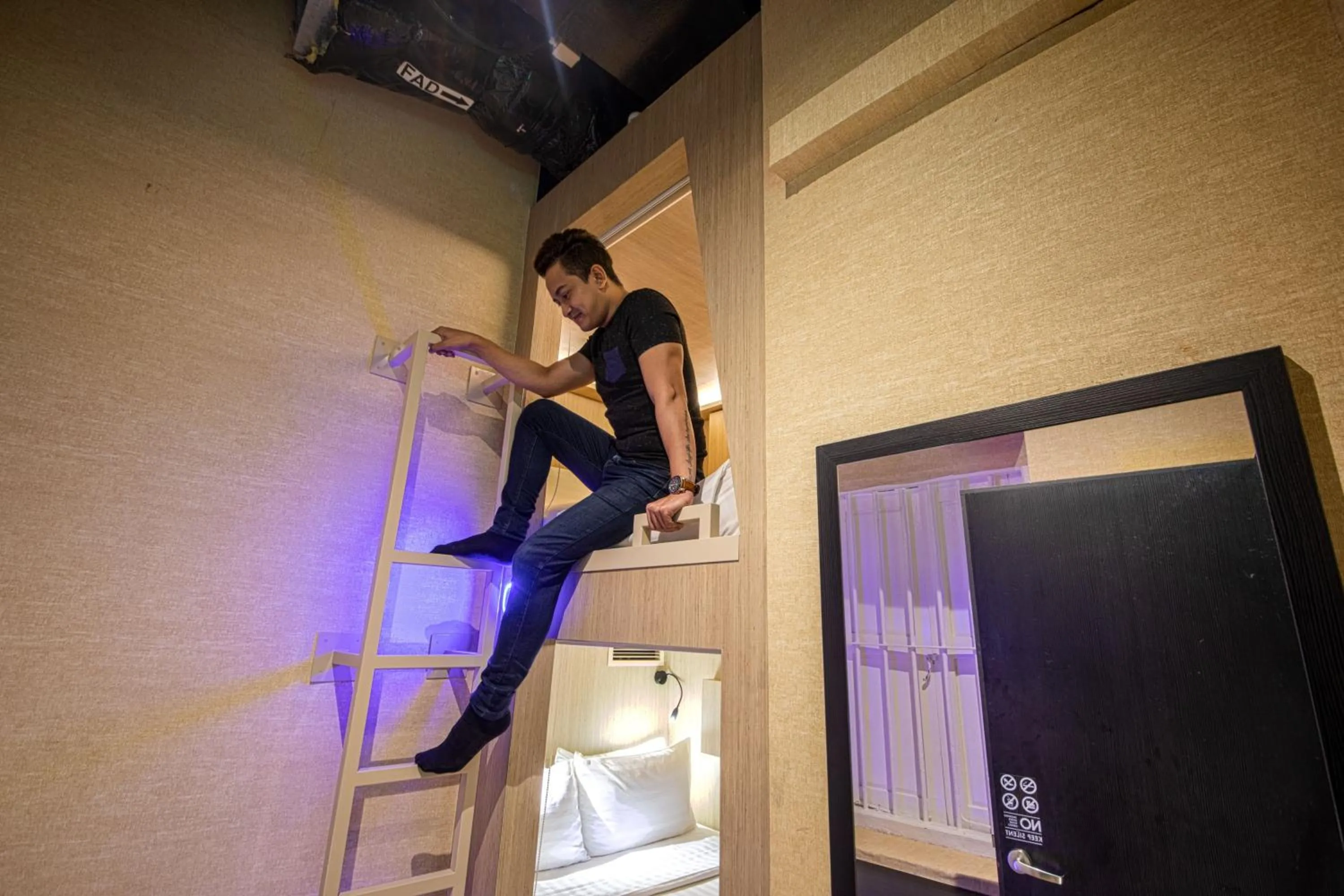 Bed in CUBE Boutique Capsule Hotel at Kampong Glam